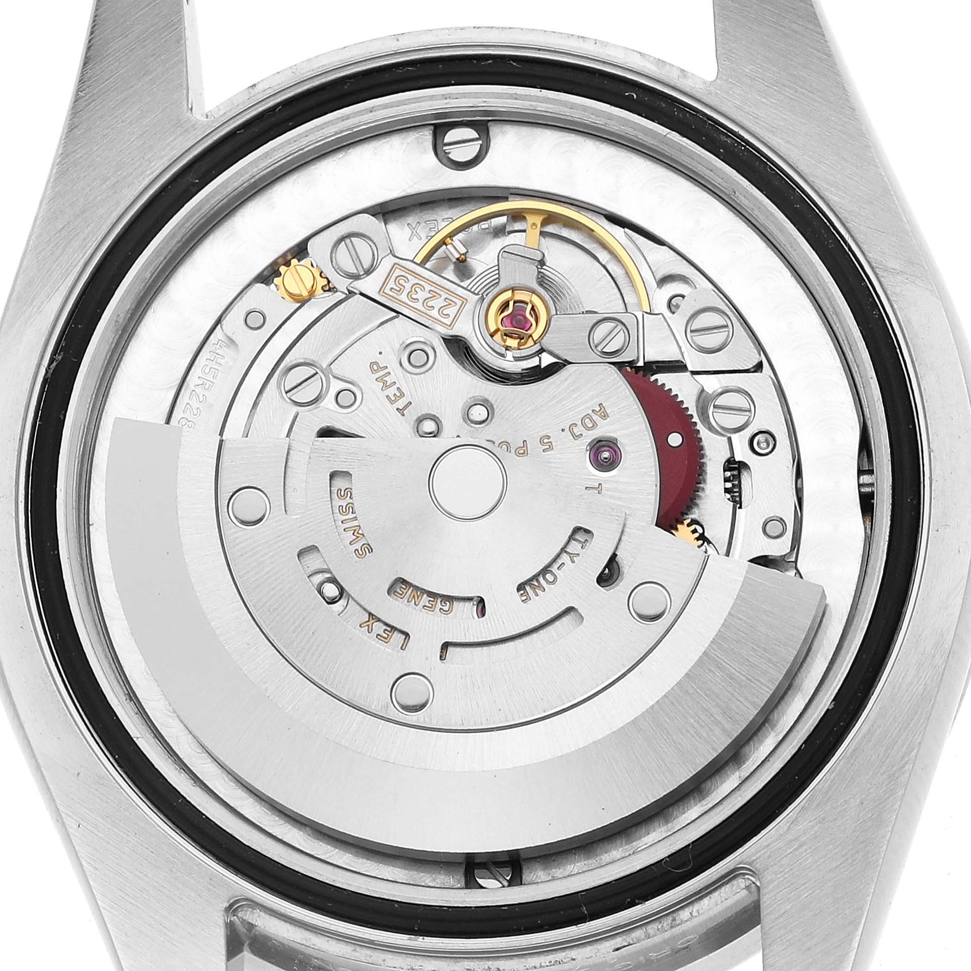 This image shows the back view of a Rolex Mid-Size 178384 Women's Stainless Steel Silver Dial model, highlighting its intricate movement and rotor.