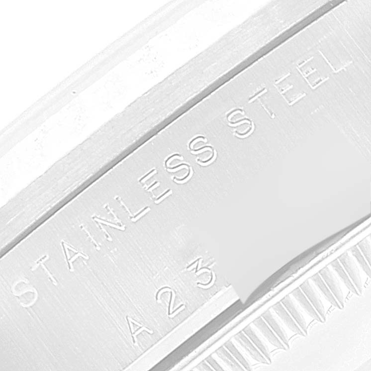 This image shows a close-up angle of the case side of a Rolex Mid-Size 78274 Women
s Stainless Steel Mother of Pearl Dial 78274 Women
s Stainless Steel Mother of Pearl Dial model, highlighting the "STAINLESS STEEL" engraving.