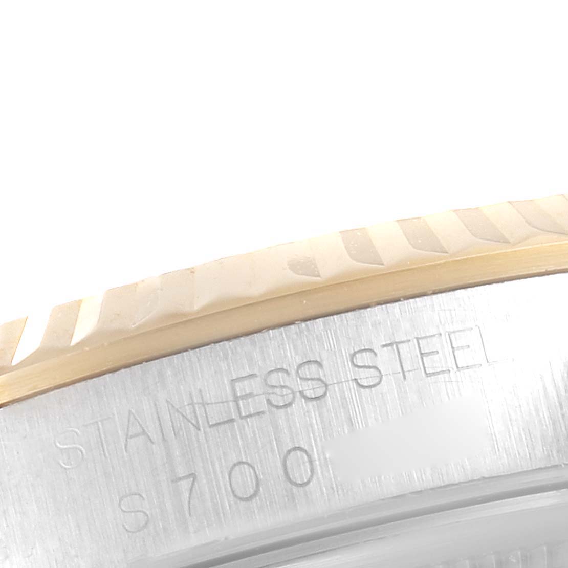 The image shows a close-up of the bezel and case back of a Rolex Datejust 16233 Men's Steel and Gold (two tone) Champagne Dial 16233 Men's Steel and Gold (two tone) Champagne Dial watch.