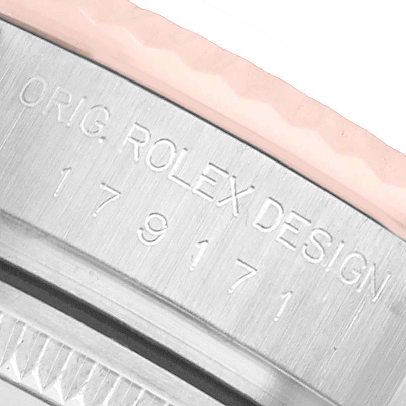 The image shows a close-up of the side of a Rolex Datejust 179171 Women's Stainless Steel Silver Dial, focusing on the engraved design and model number.