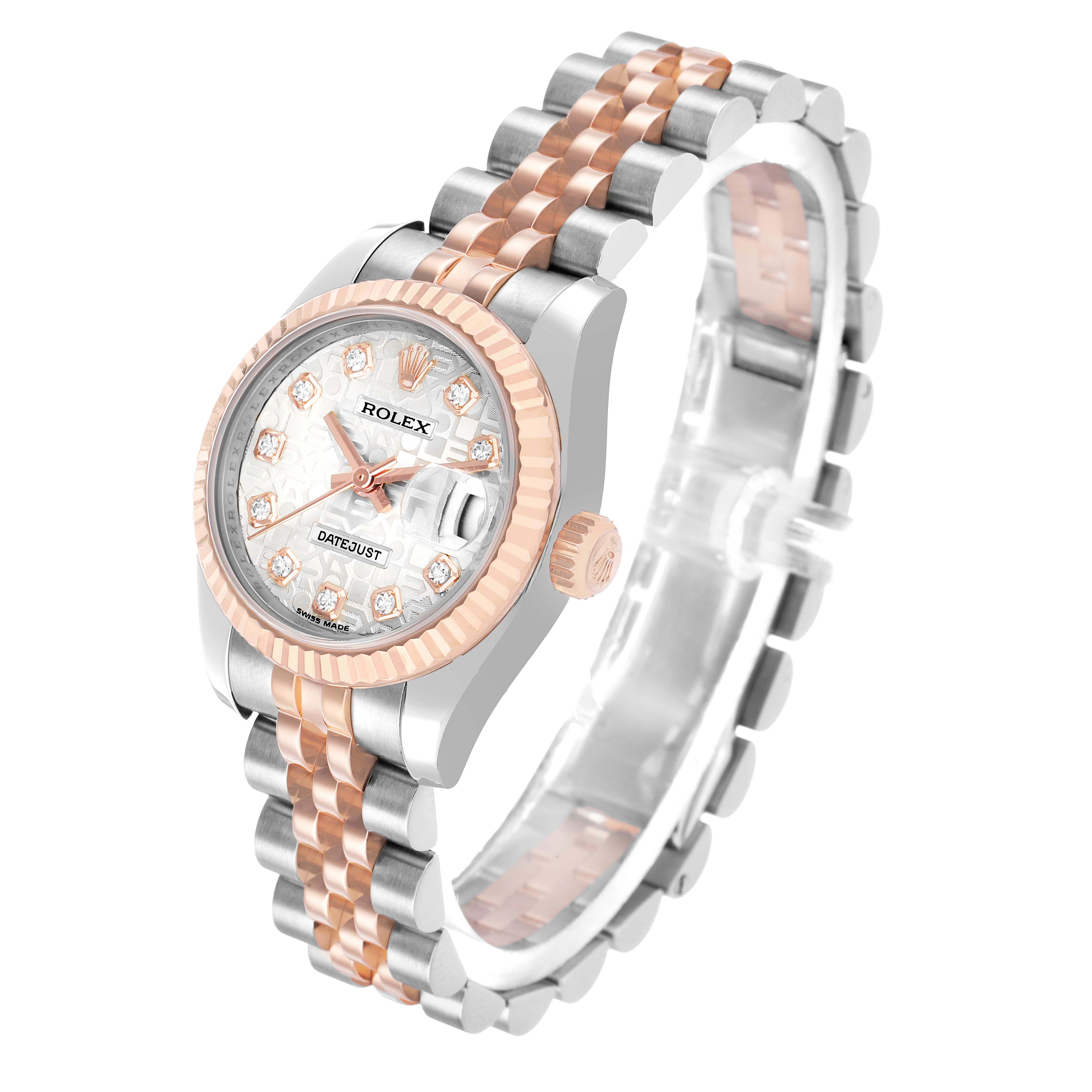 The Rolex Datejust 179171 Women's Stainless Steel Silver Dial watch is shown at a 3/4 angle, displaying the face, fluted bezel, crown, and jubilee bracelet.