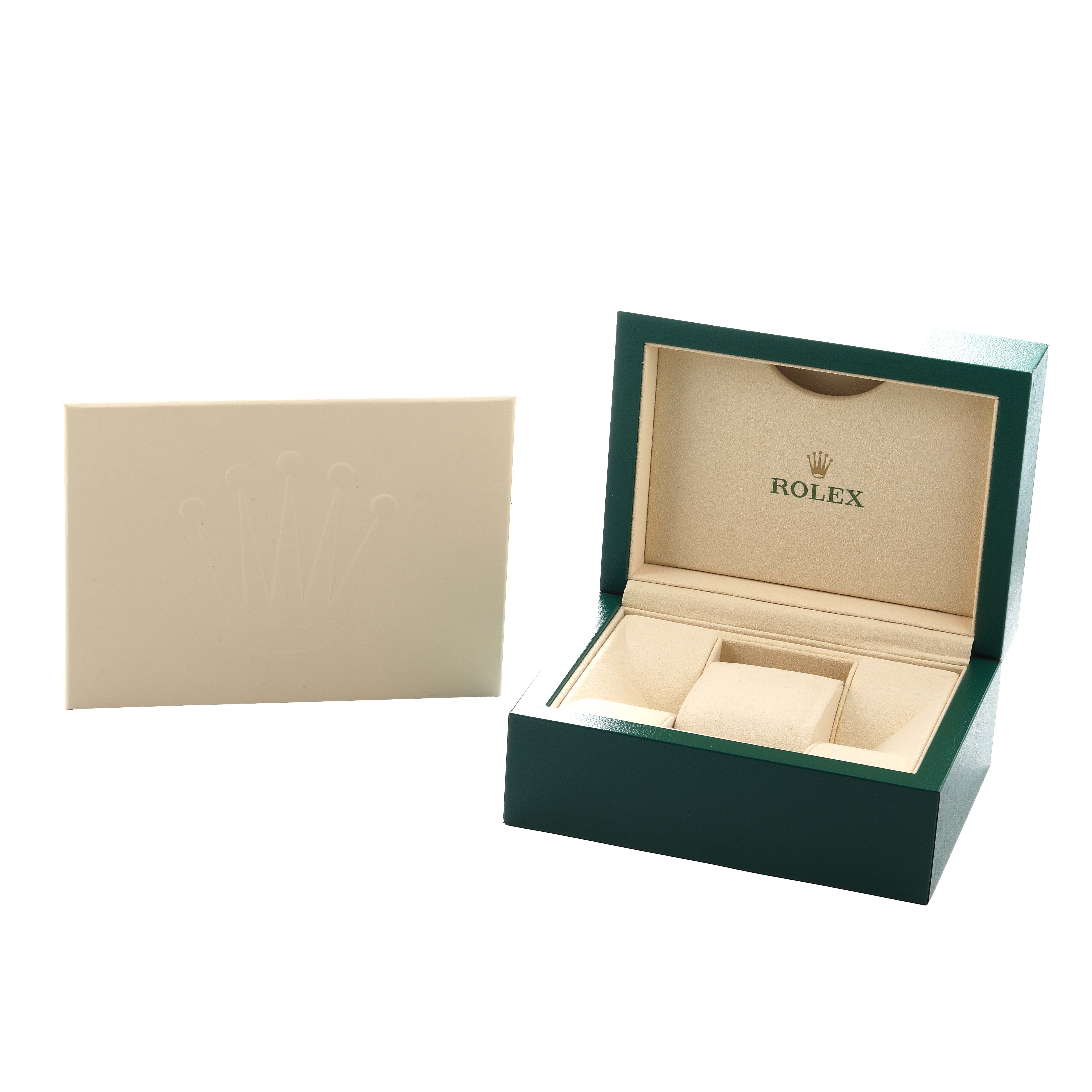 The image shows an open Rolex Datejust 179171 Women's Stainless Steel Silver Dial watch box with an inner cushion, alongside an embossed beige envelope.