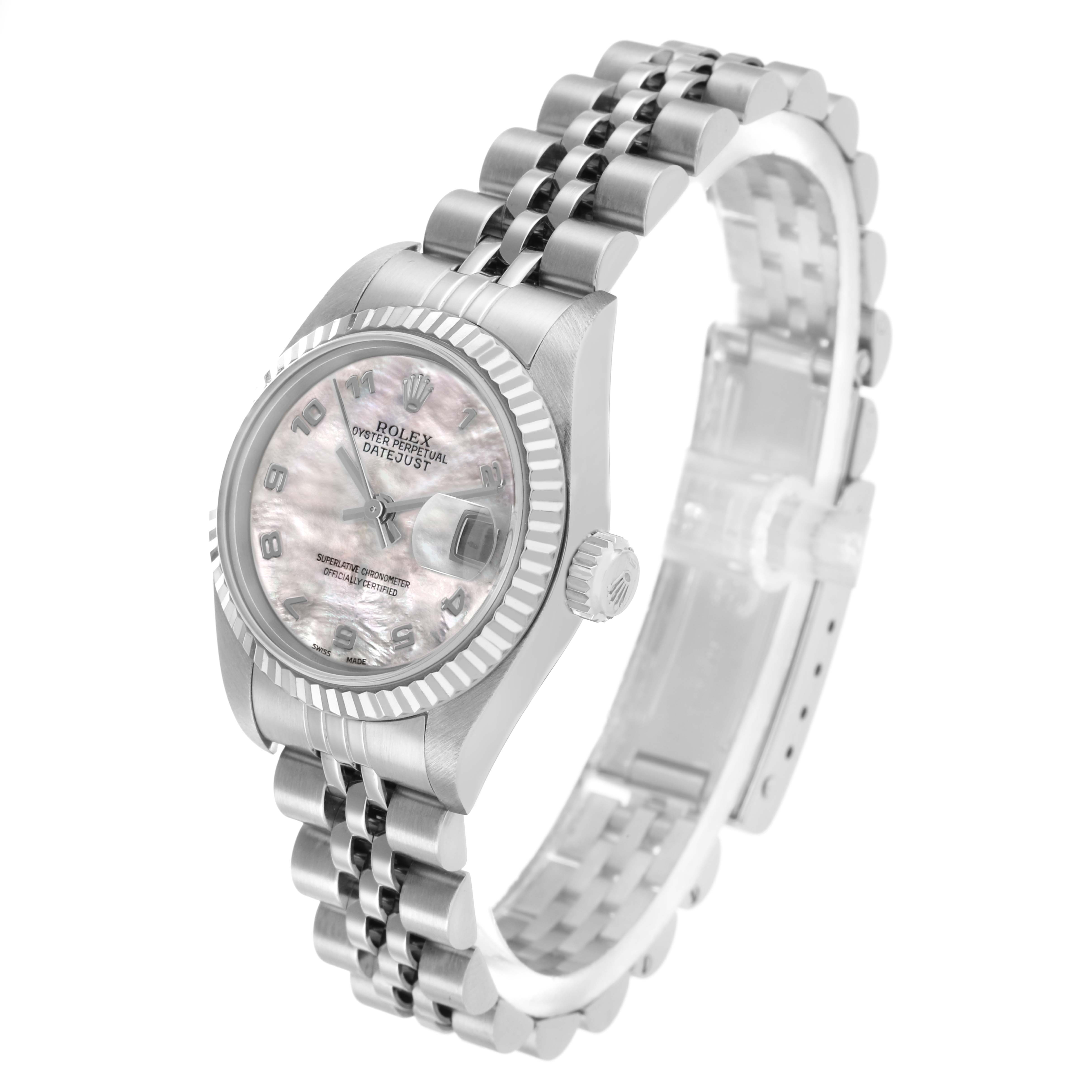 The Rolex Datejust 79174 Women's Stainless Steel Mother of Pearl Dial watch is shown at a three-quarter angle, highlighting its face, bezel, crown, and bracelet.