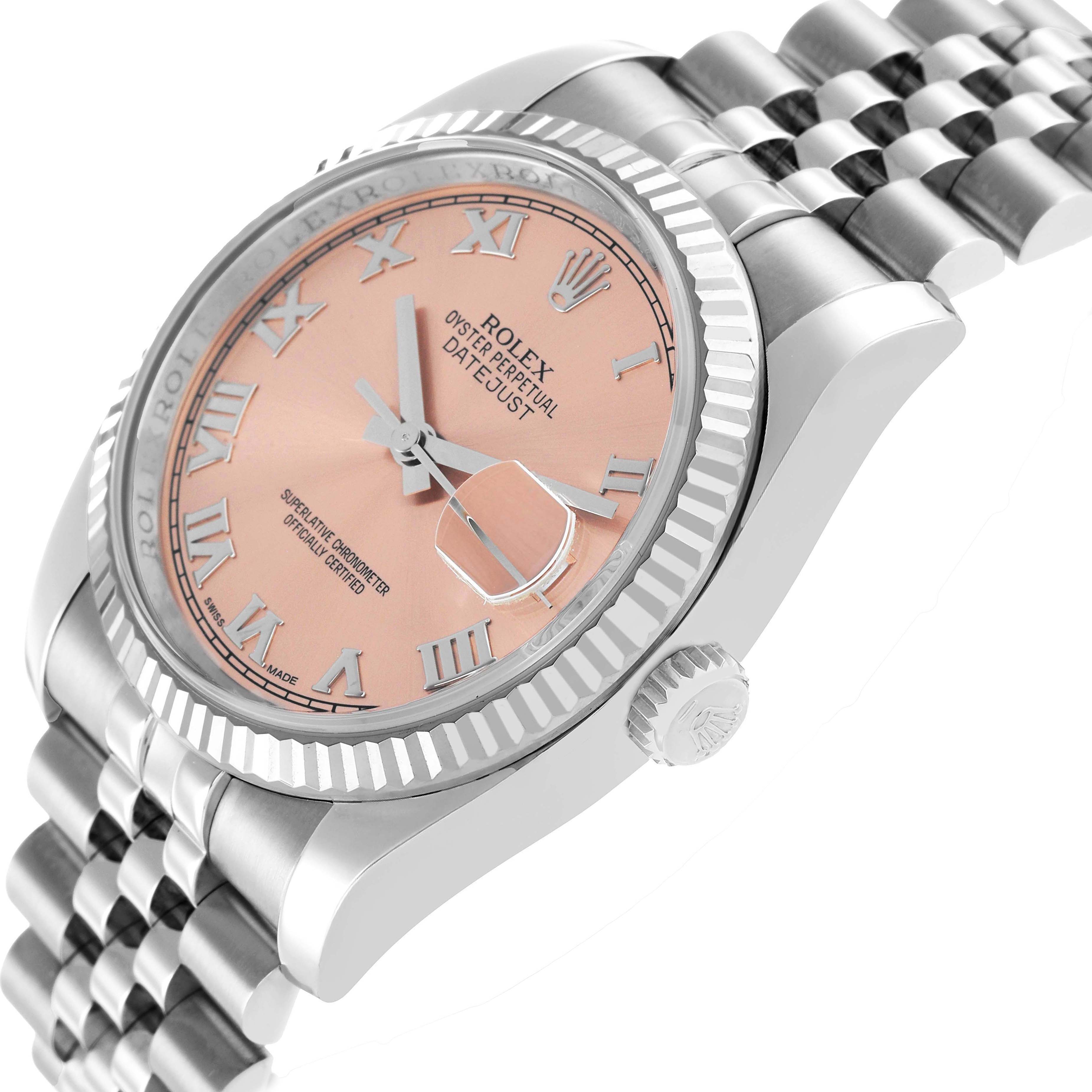 The Rolex Datejust 116234 Men's Stainless Steel Pink Dial watch is shown from a side angle, highlighting the dial, fluted bezel, and Jubilee bracelet.