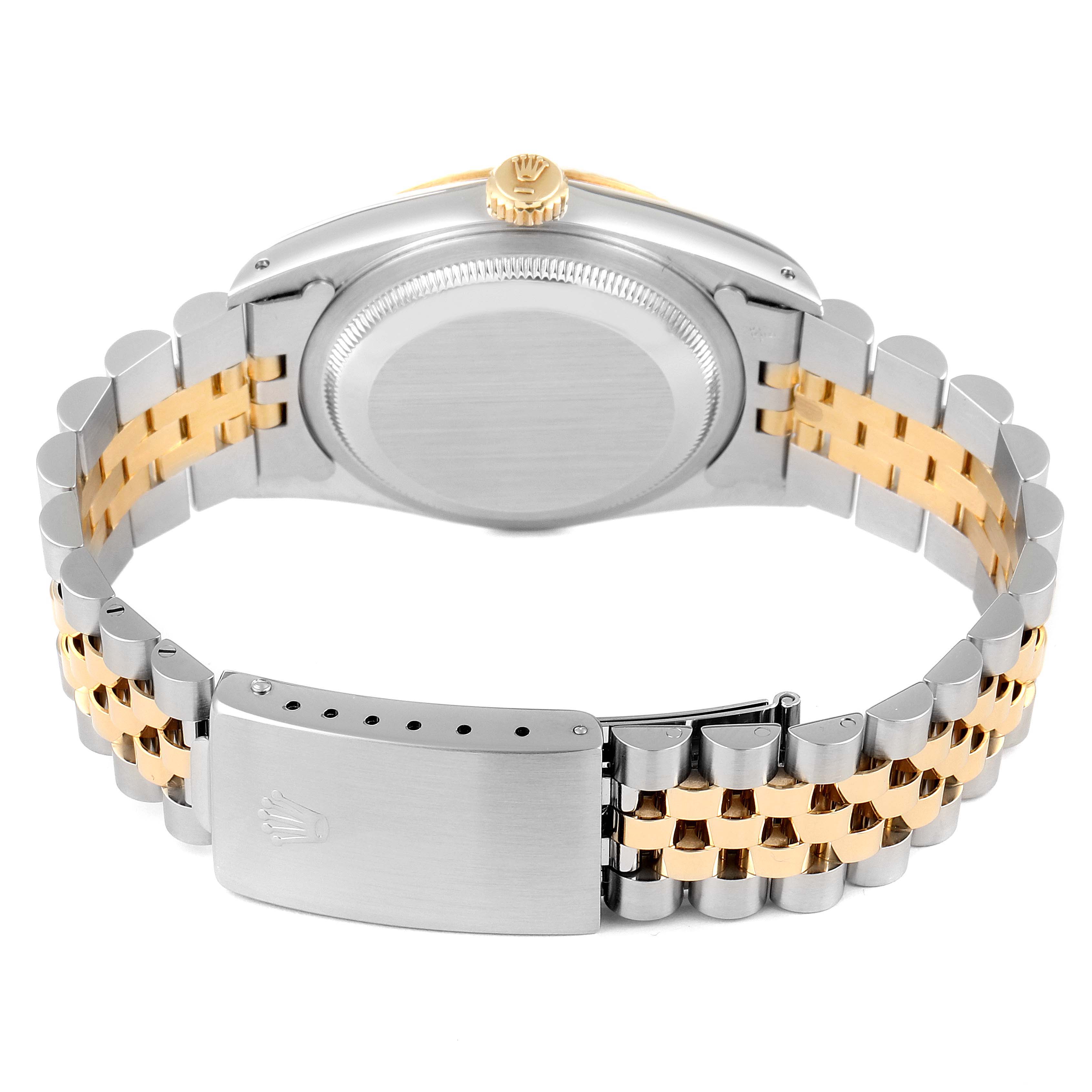 The image shows the back case and bracelet of a Rolex Datejust 16233 Men's Steel and Gold (two tone) Black Dial 16233 Men's Steel and Gold (two tone) Black Dial watch, featuring a two-tone metal design.