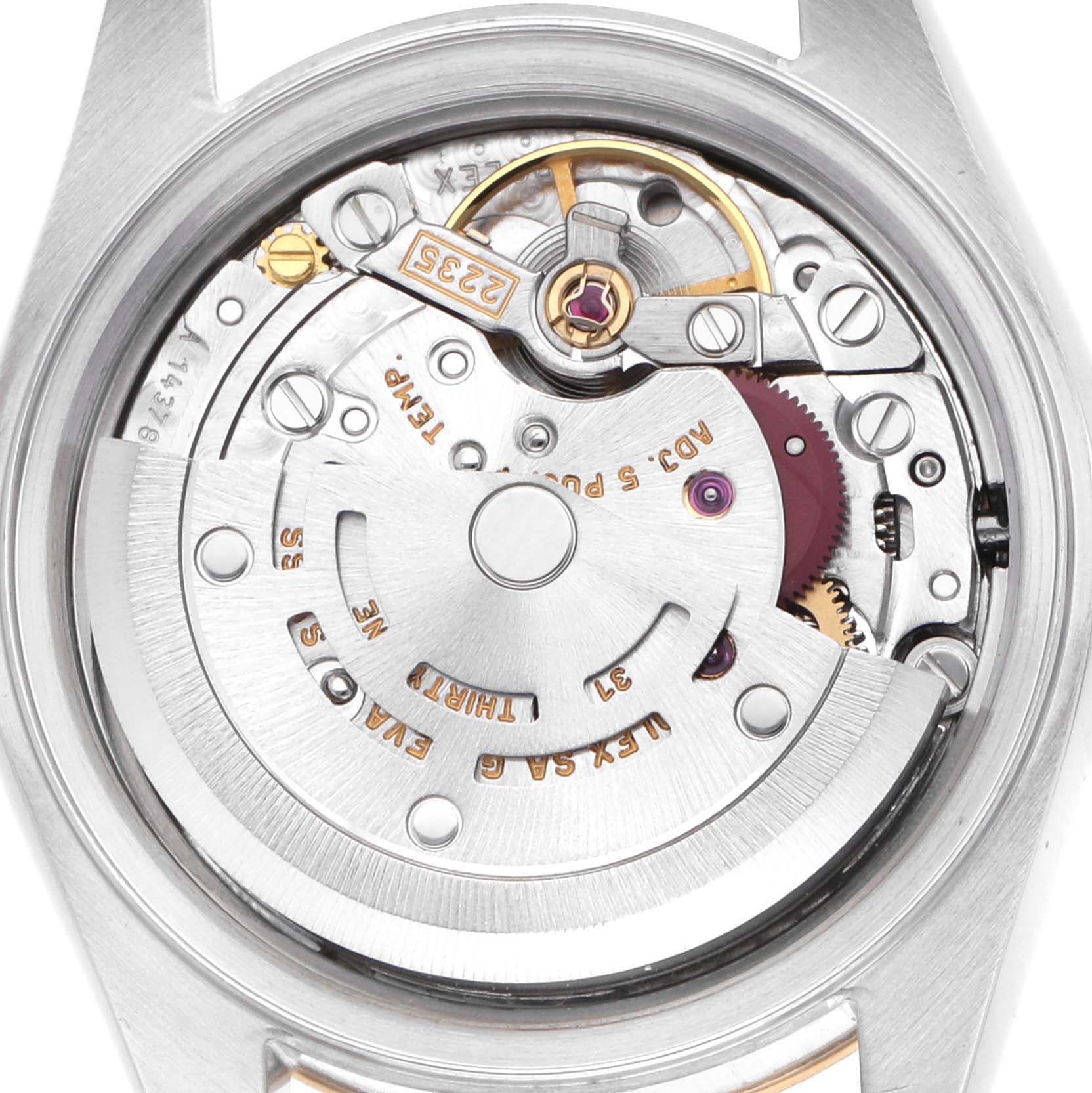The image shows the back of a Rolex Datejust 79173 Women's Steel and Gold (two tone) Champagne Dial, highlighting the movement and inner mechanics.