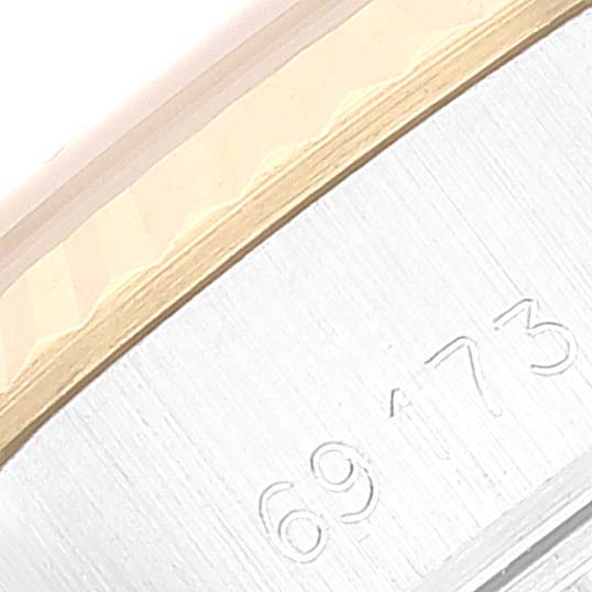This image shows a close-up of the engraved model number on the case of a Rolex Datejust 69173 Women's Steel and Gold (two tone) Champagne Dial 69173 Women's Steel and Gold (two tone) Champagne Dial watch.