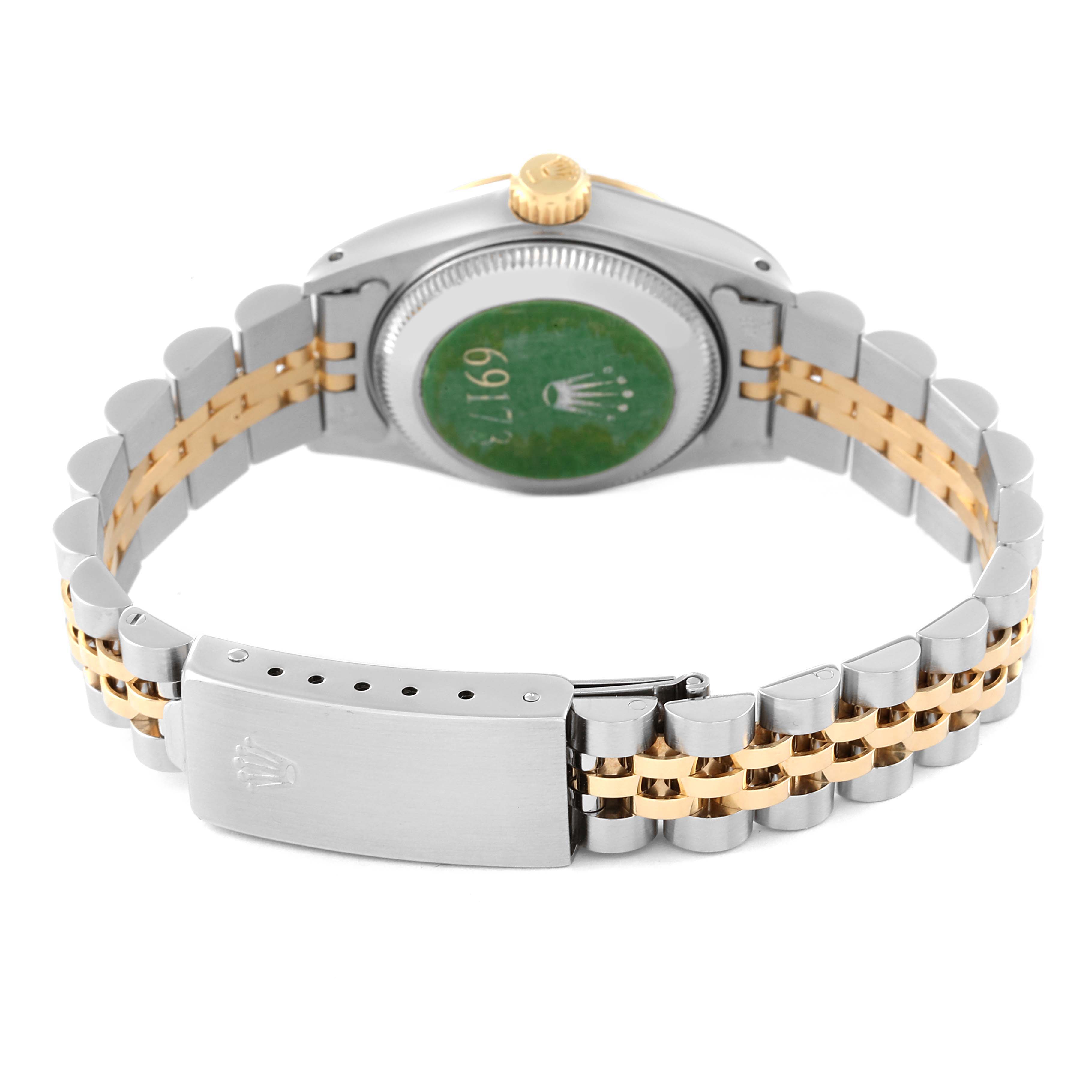 The image shows the back of a Rolex Datejust 69173 Women's Steel and Gold (two tone) Champagne Dial 69173 Women's Steel and Gold (two tone) Champagne Dial watch, highlighting its two-tone jubilee bracelet and clasp.