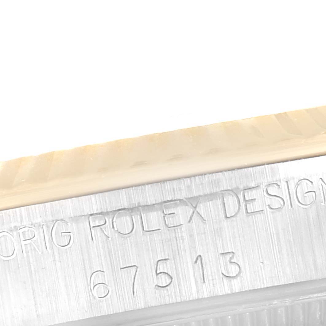 The image shows a close-up of the side of a Mid-Size Rolex watch case, displaying the engraved model number "67513" and "ORIG ROLEX DESIGN."