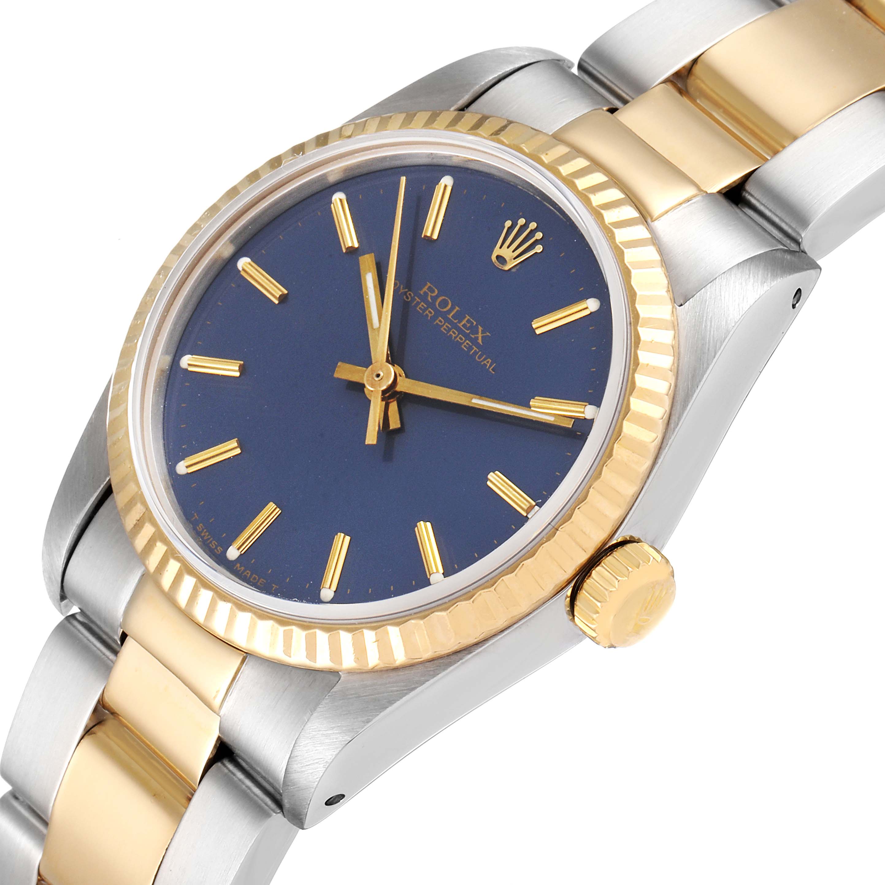 The image shows a Rolex Mid-Size 67513 Women's Steel and Gold (two tone) Blue Dial 67513 Women's Steel and Gold (two tone) Blue Dial watch at an angle displaying the dial, bezel, and partial bracelet.