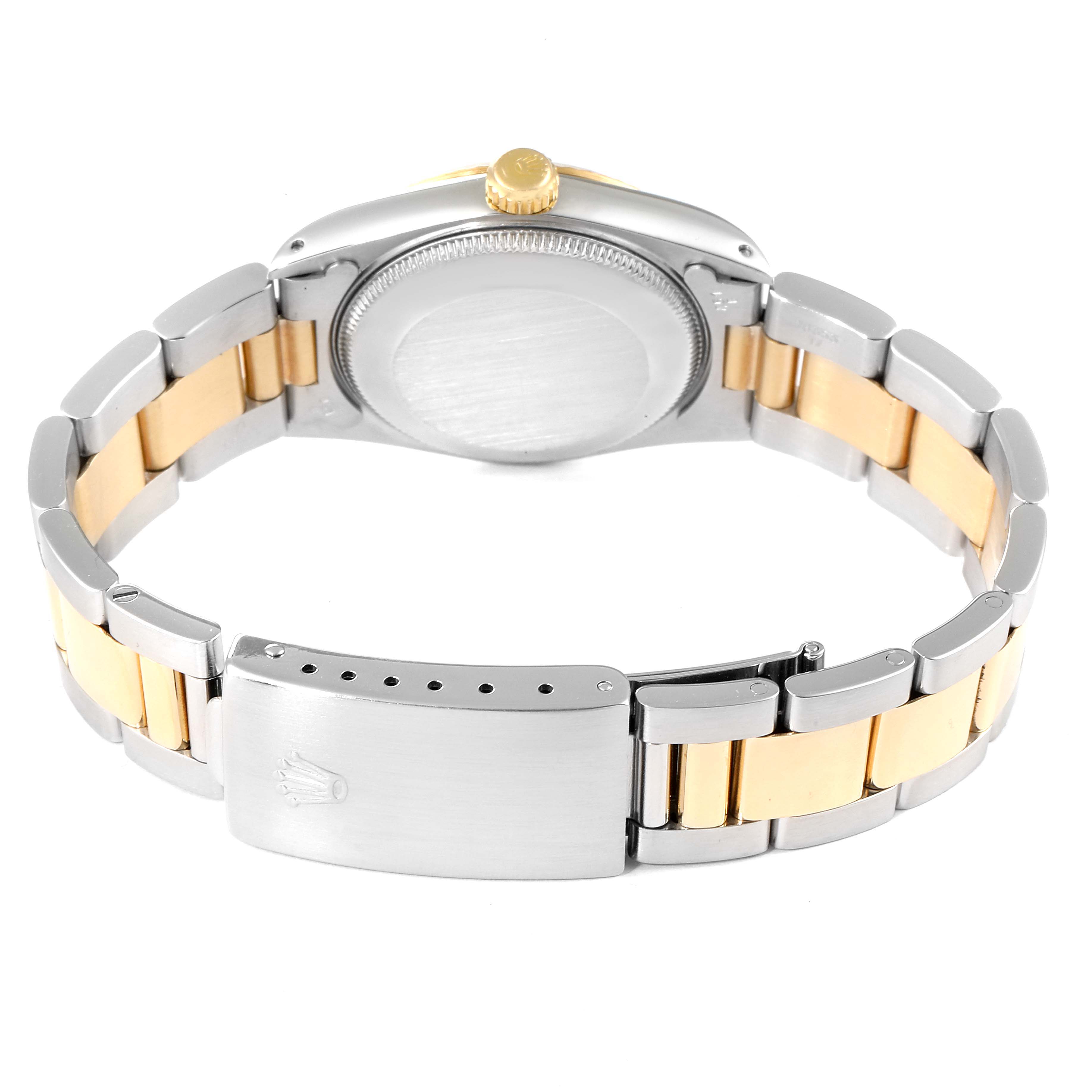 This image shows the backside and bracelet of a Rolex Mid-Size 67513 Women's Steel and Gold (two tone) Blue Dial 67513 Women's Steel and Gold (two tone) Blue Dial watch, focusing on the clasp and crown.