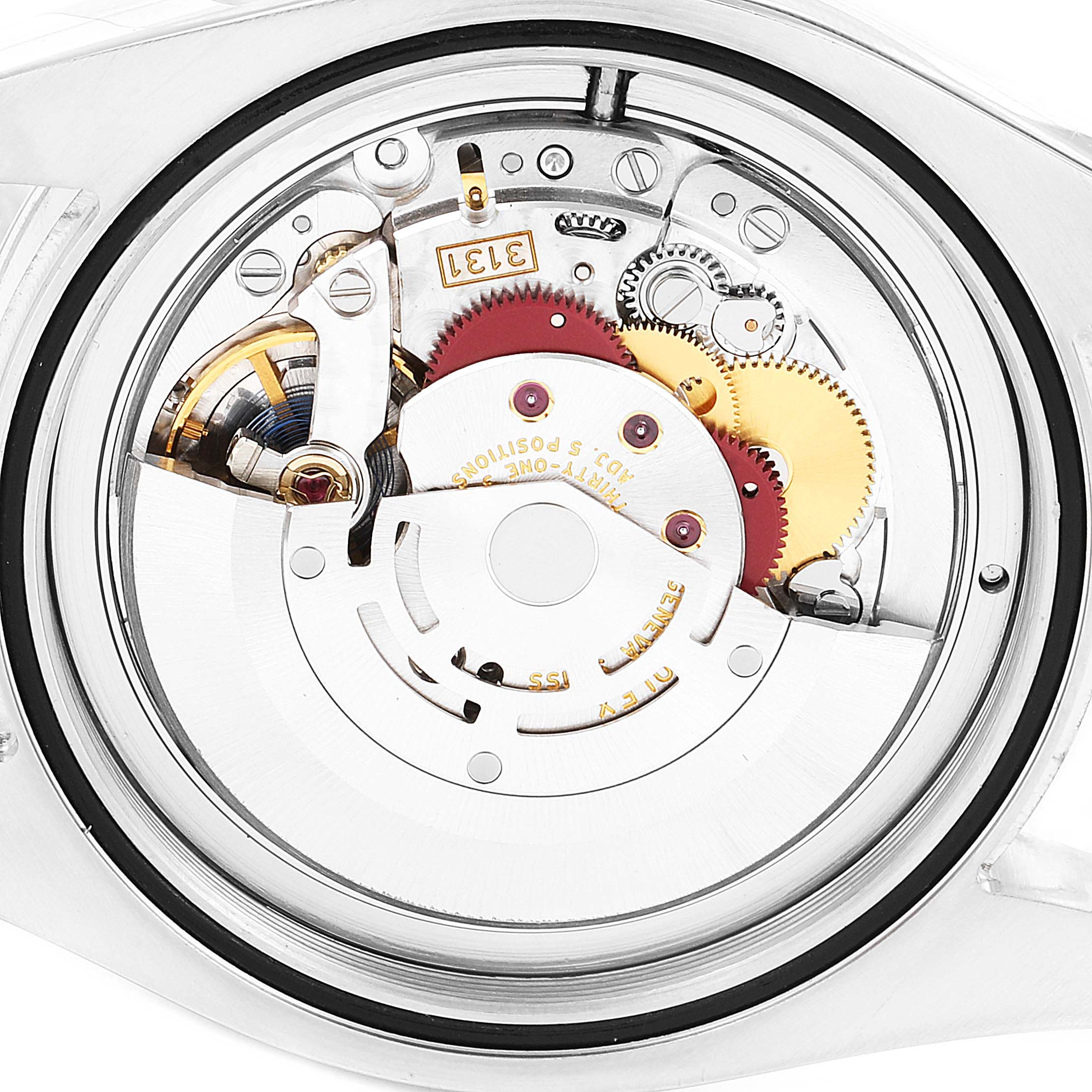 The image shows the movement of a Rolex Milgauss 116400V Men
s Stainless Steel White Dial 116400V Men
s Stainless Steel White Dial watch viewed from the back, displaying its intricate gears and components.