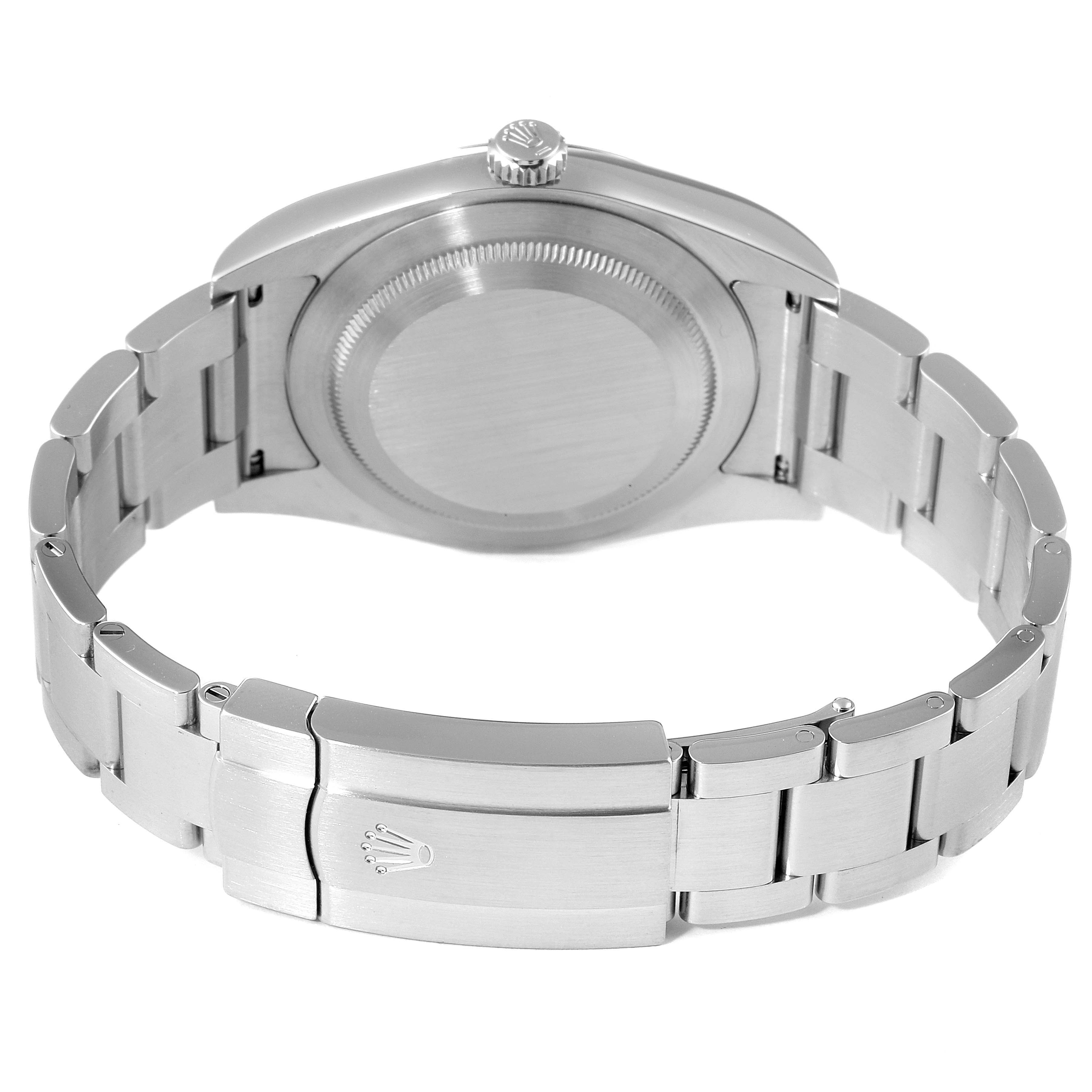 The image shows the back view of a Rolex Oyster Perpetual 114300 Men
s Stainless Steel Black Dial 114300 Men
s Stainless Steel Black Dial watch, highlighting the case back, crown, and bracelet with clasp.