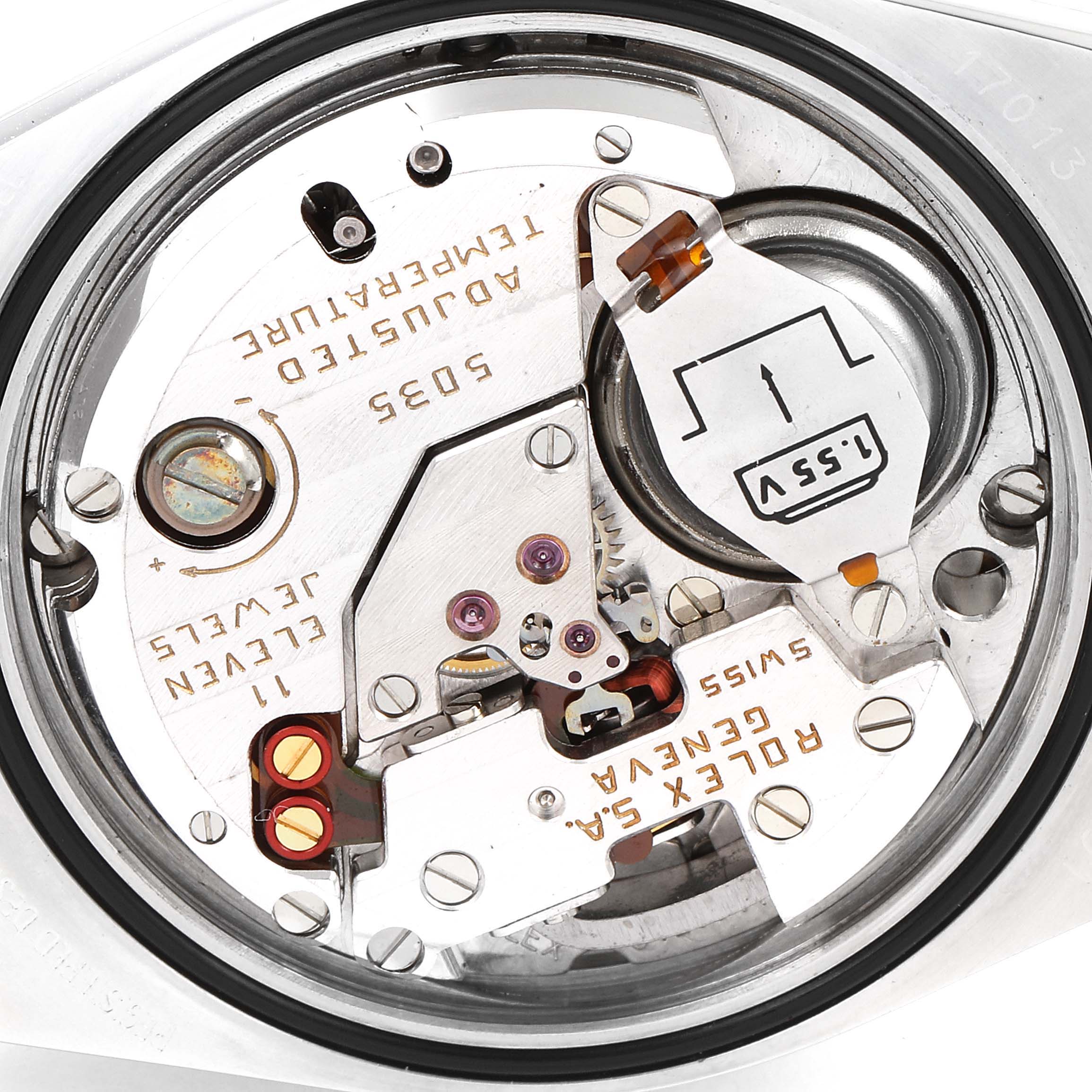 This image shows the backside of a Rolex Oysterquartz 17013 Men's Steel and Gold (two tone) Champagne Dial 17013 Men's Steel and Gold (two tone) Champagne Dial watch, displaying its mechanical interior parts.