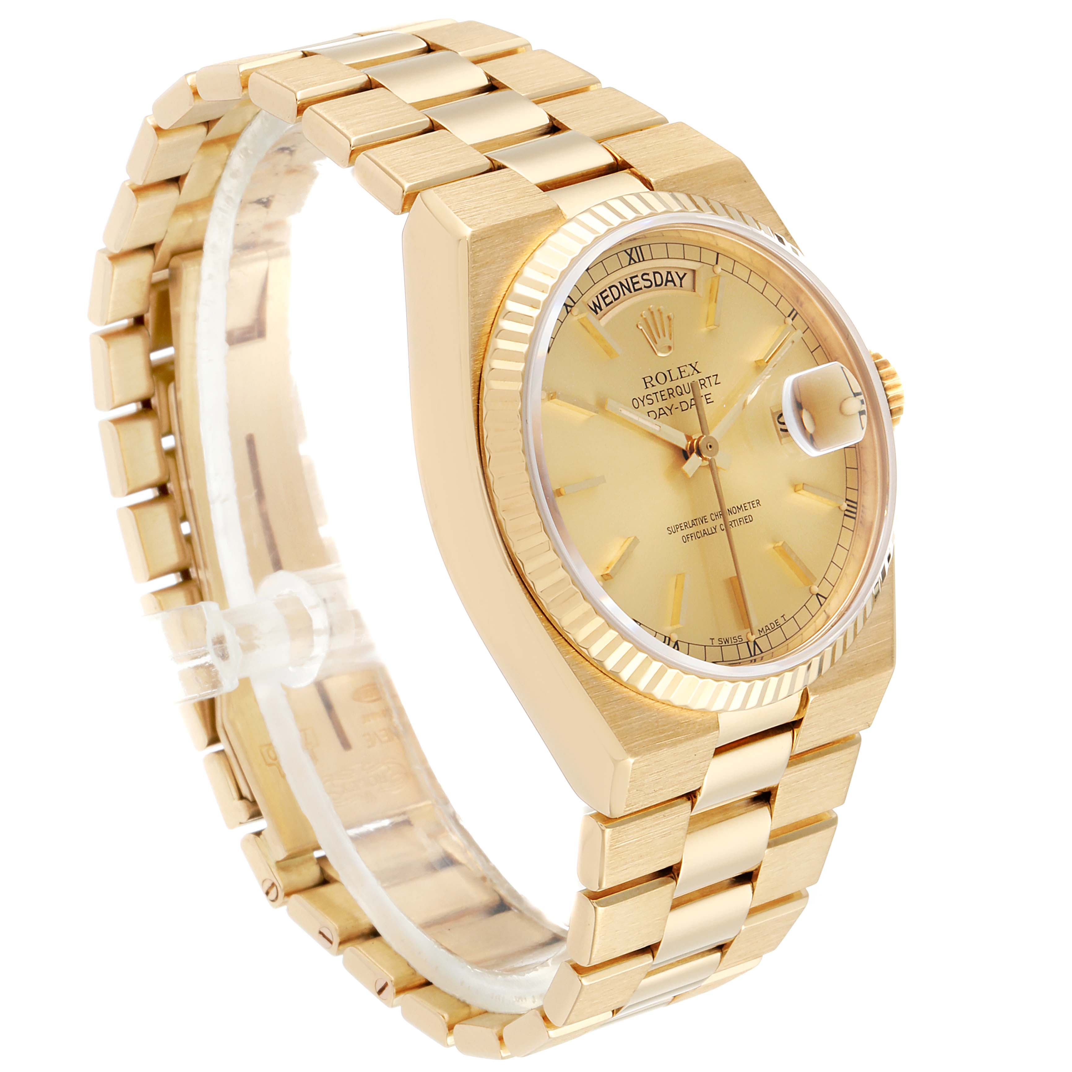 The Rolex Oysterquartz 19018 Men's Yellow Gold Champagne Dial 19018 Men's Yellow Gold Champagne Dial watch is depicted at a three-quarter angle, showing its golden bracelet, case, dial, and fluted bezel.