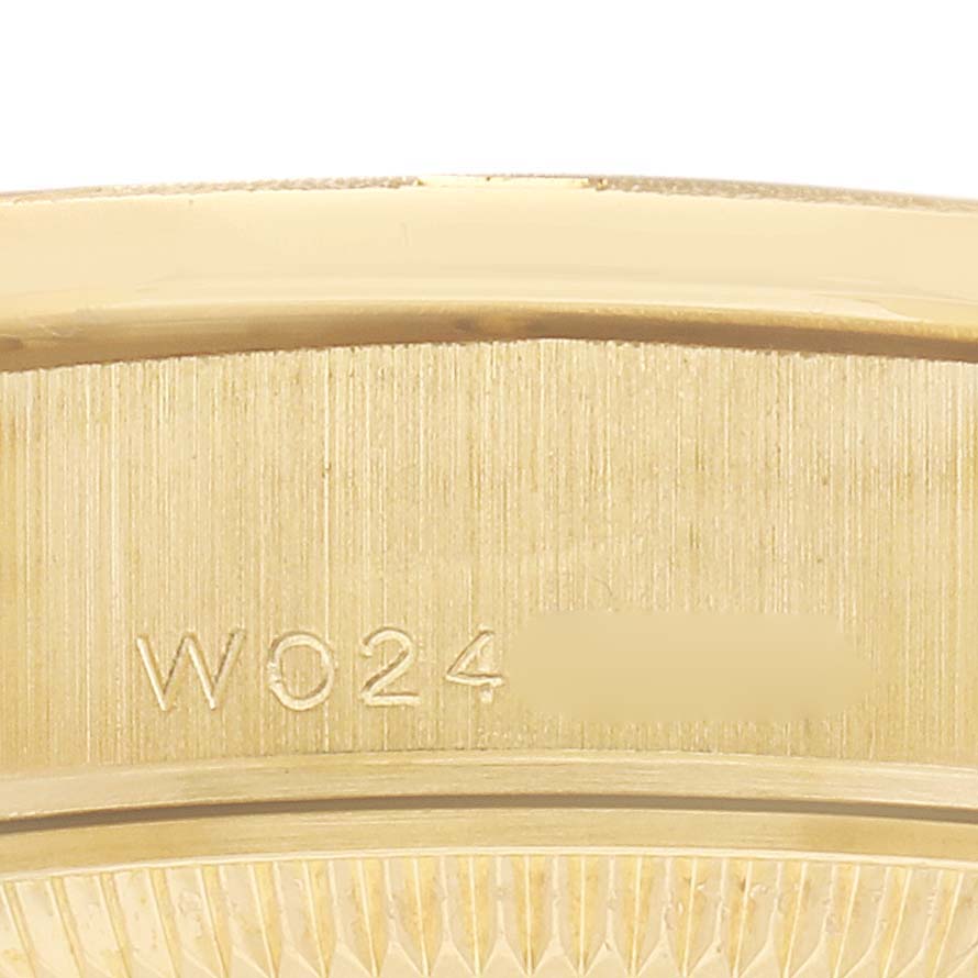 The image shows a close-up side view of the case rim with model markings on a Rolex President 69288 Women's Yellow Gold Champagne Dial watch.