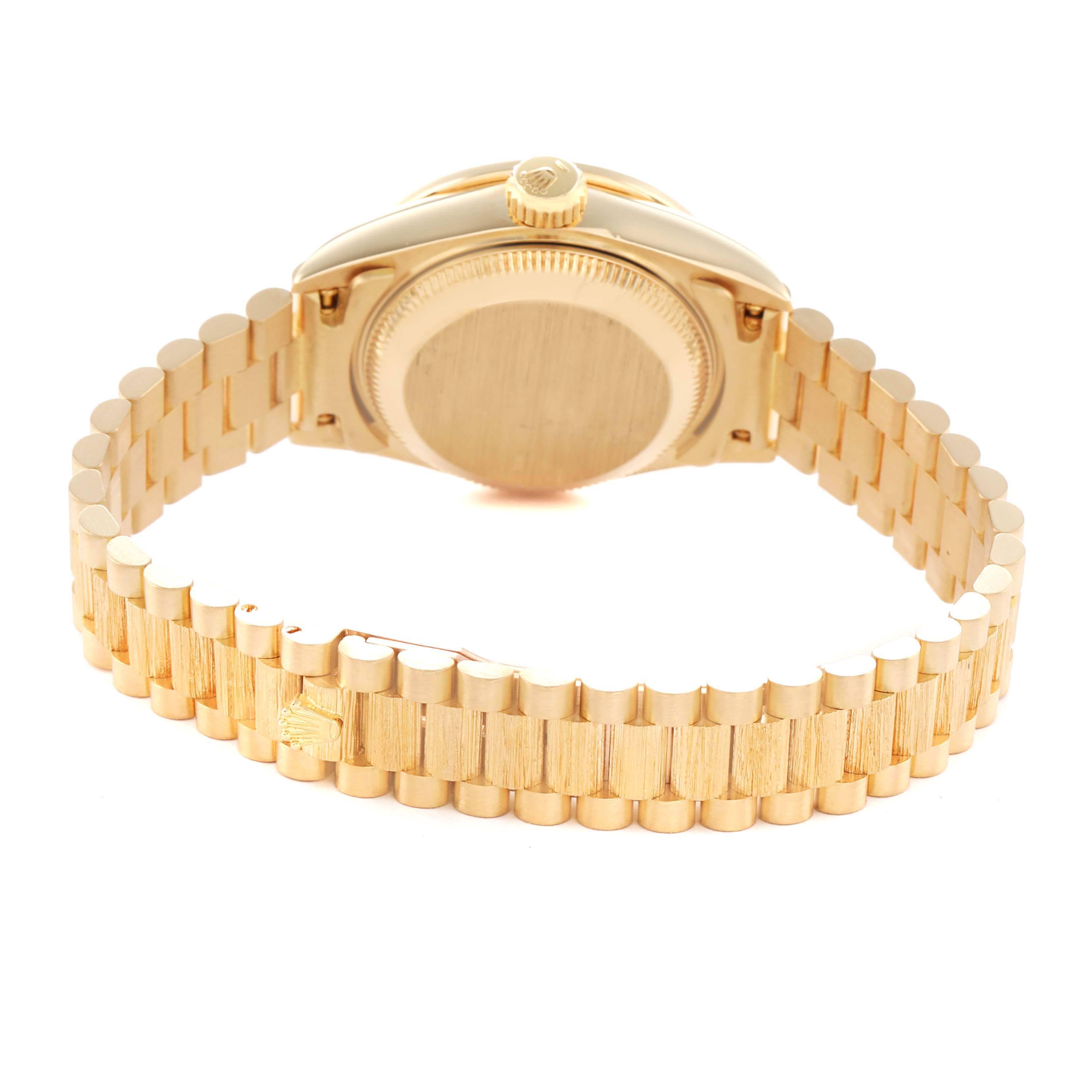 The image shows the back of a Rolex President 69288 Women's Yellow Gold Champagne Dial watch, highlighting its case back, crown, and gold bracelet.