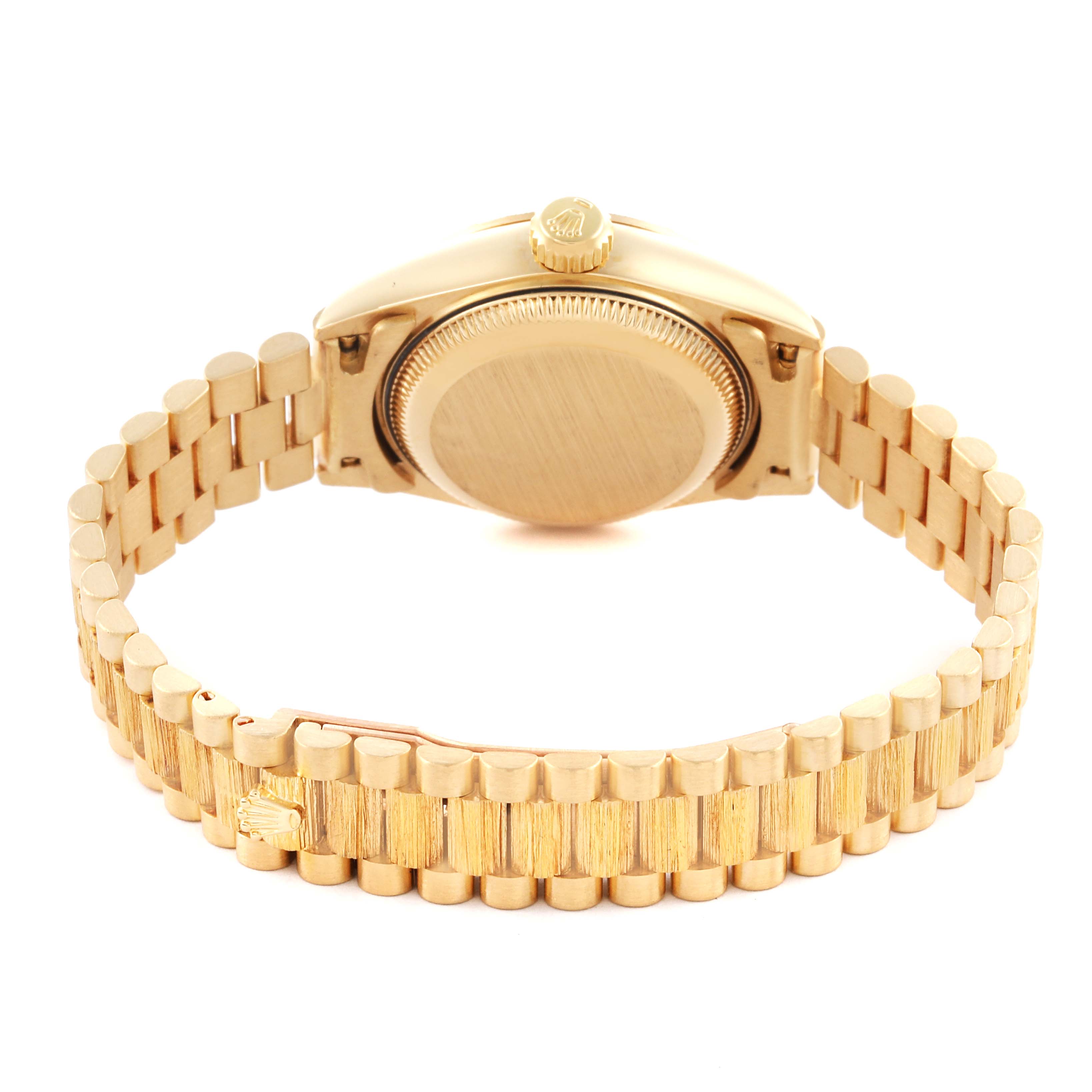 The image shows the underside of the Rolex President 69278 Women's Yellow Gold Champagne Dial 69278 Women's Yellow Gold Champagne Dial model, highlighting the bracelet and case back.