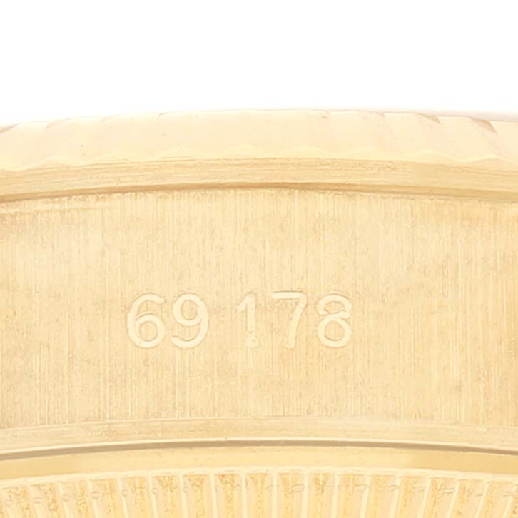 This image shows a close-up of the model number "69178" engraved on the underside of a Rolex President 69178 Women
s Yellow Gold Champagne Dial 69178 Women
s Yellow Gold Champagne Dial watch.