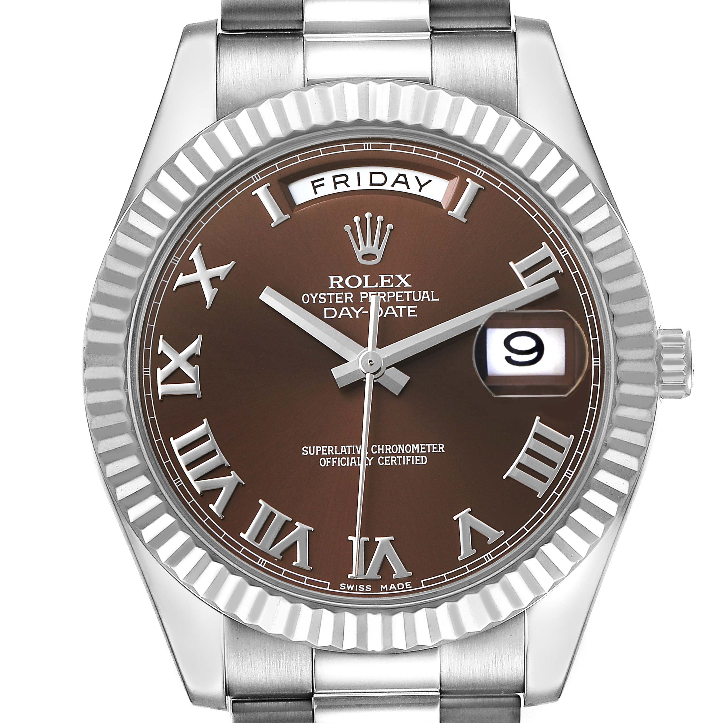 The image shows a front view of a Rolex President 218239 Men's White Gold Brown Dial model watch, highlighting the brown dial, Roman numerals, day, and date display.