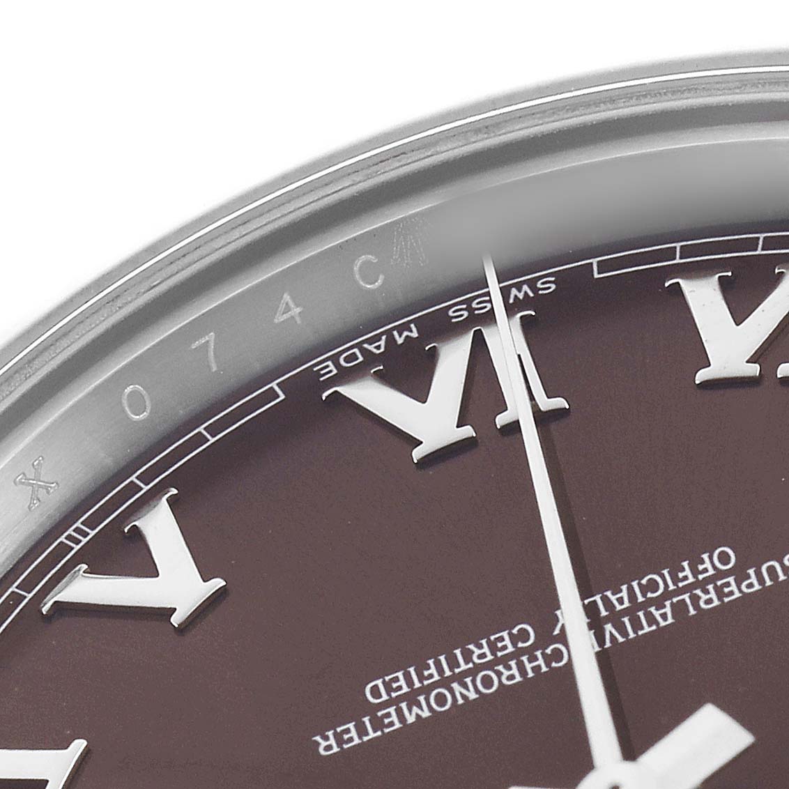 The image shows a close-up of the dial, bezel, and Roman numerals on the Rolex President 218239 Men's White Gold Brown Dial watch.