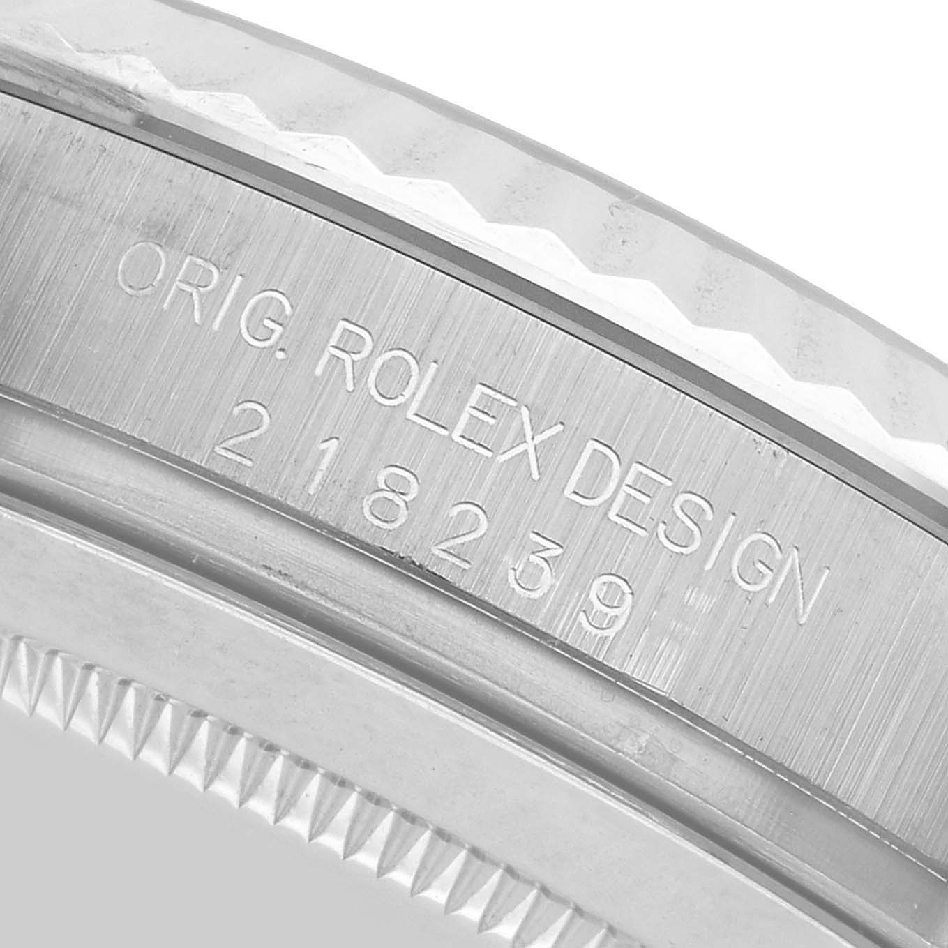 The image shows a close-up of the side engraving on a Rolex President 218239 Men's White Gold Silver Dial watch, indicating its model number.
