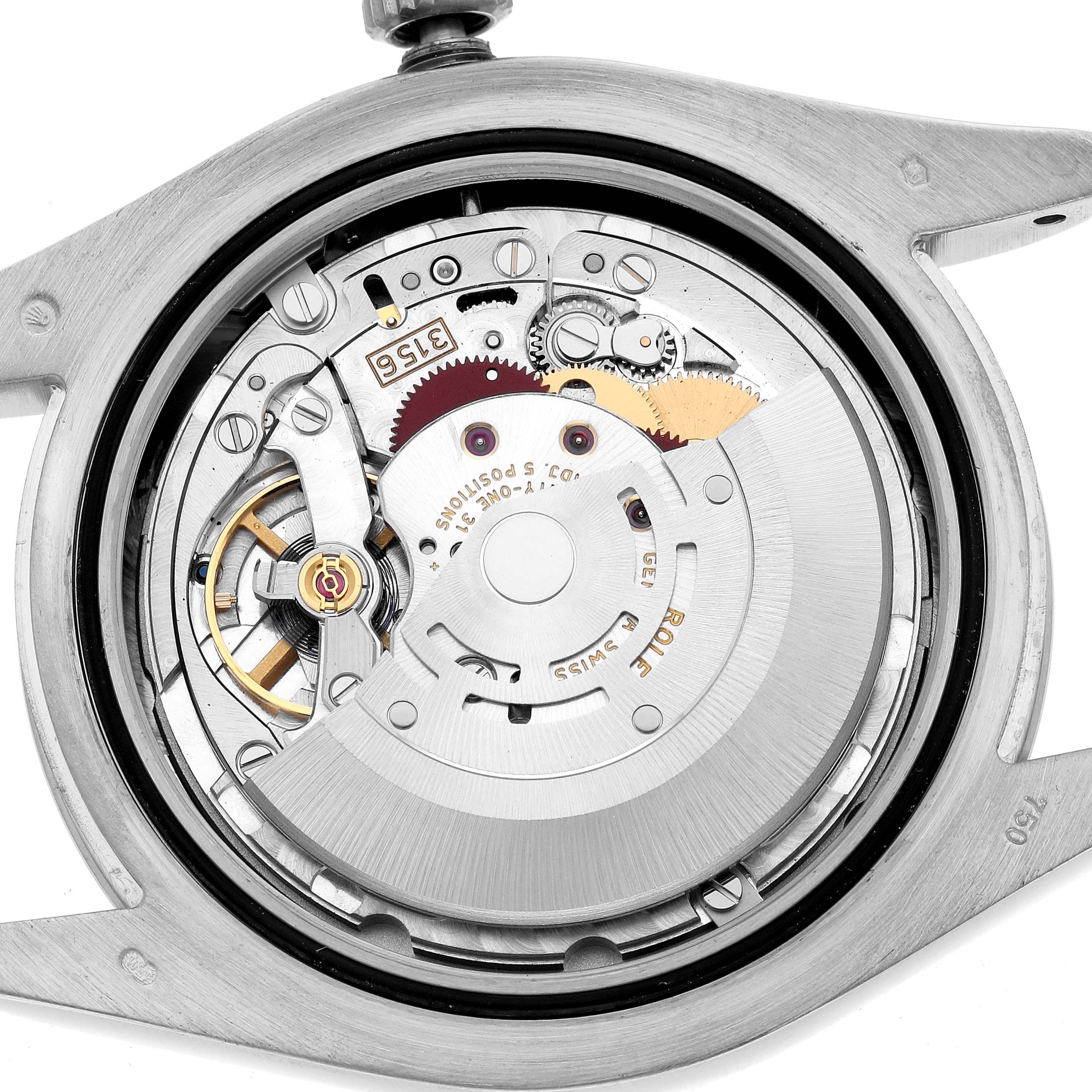The image shows the inner mechanical movement of a Rolex President 218239 Men's White Gold Silver Dial watch, focusing on the gears and rotor.