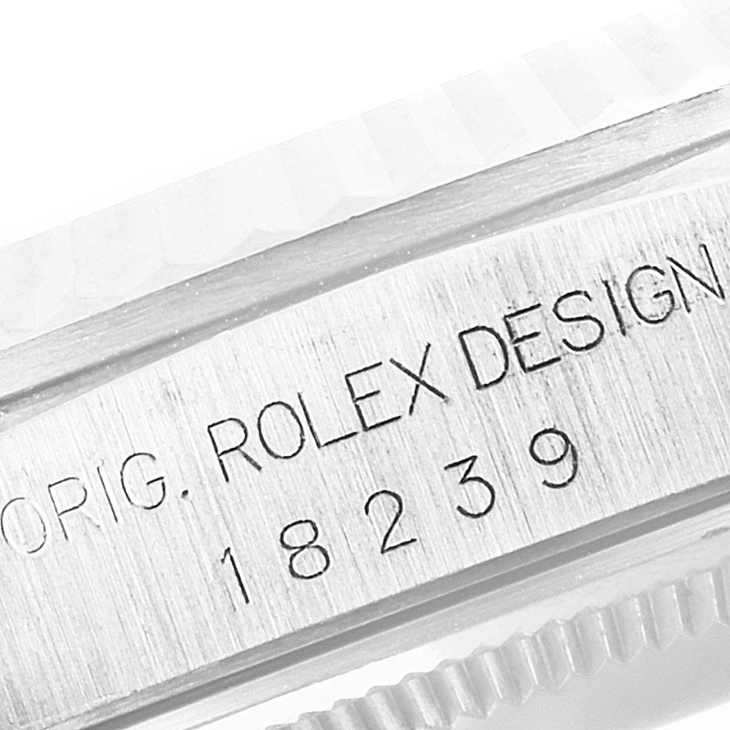 This close-up angle shows the engraving on the case side of the Rolex President 18239 Men
s White Gold Silver Dial 18239 Men
s White Gold Silver Dial model, displaying "ORIG. ROLEX DESIGN 18239."