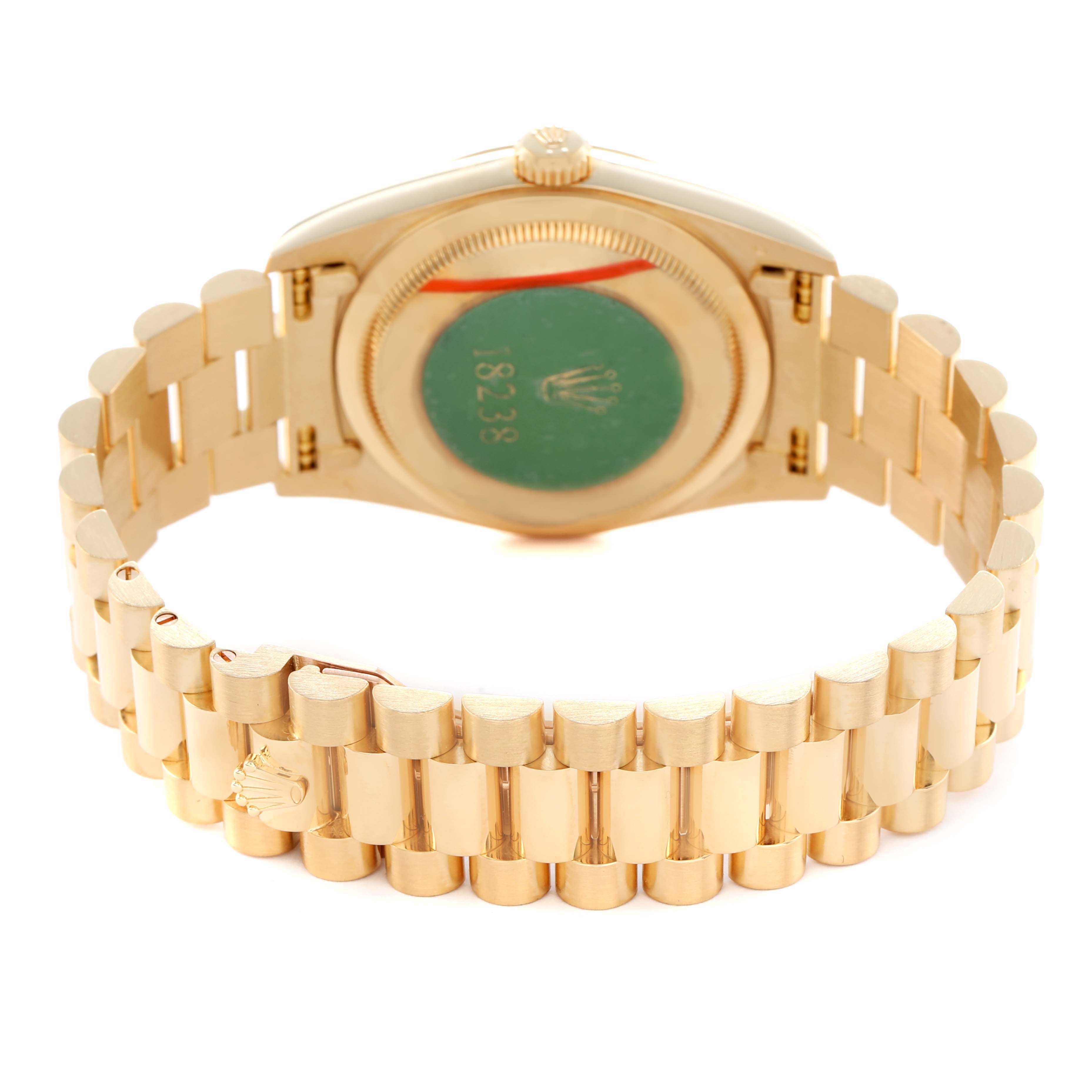 The image shows the back view of a Rolex President 18238 Men's Yellow Gold Brown Dial model, highlighting the bracelet and case back.