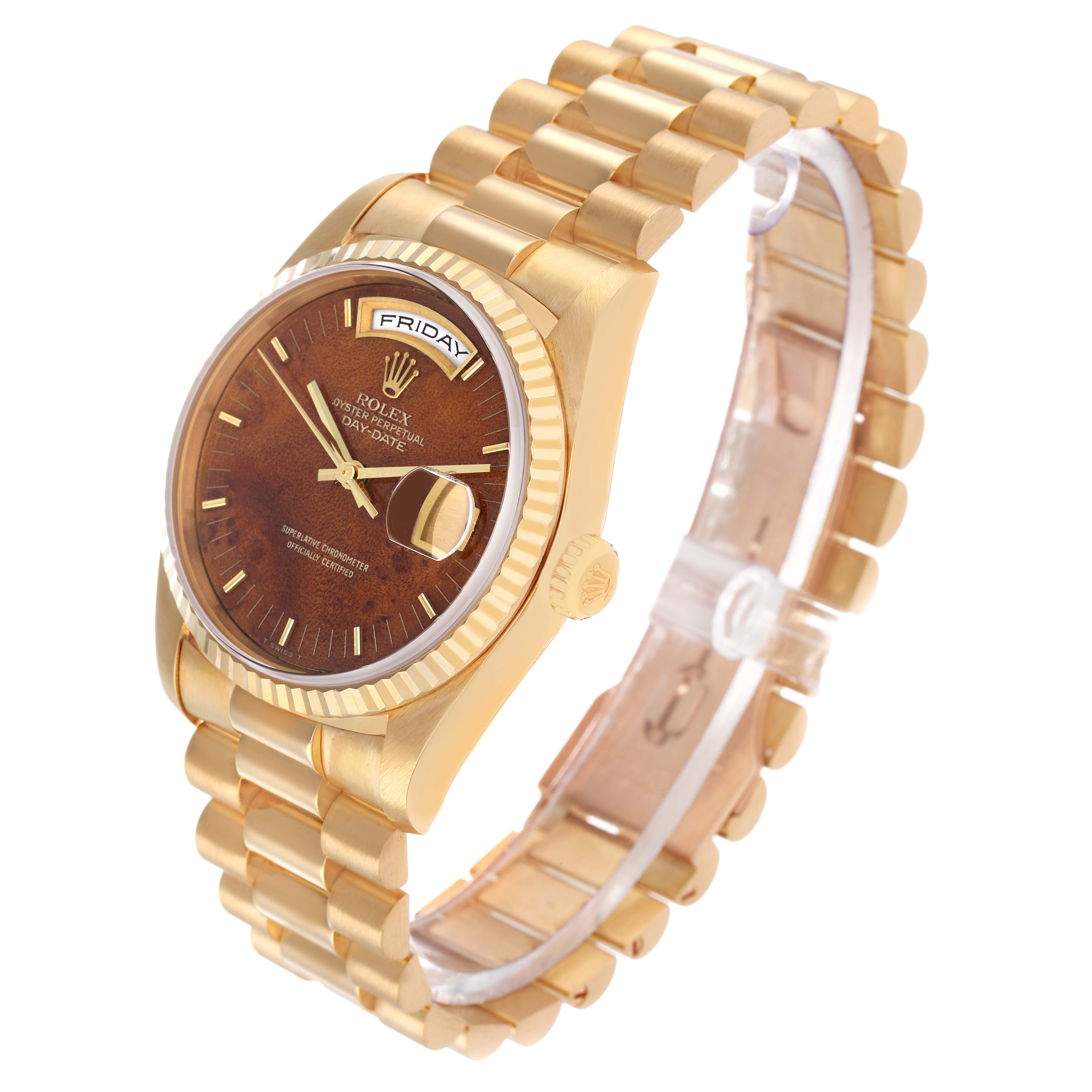 The Rolex President 18238 Men's Yellow Gold Brown Dial model watch is shown from a three-quarter angle highlighting its gold bezel, dial, crown, and bracelet.