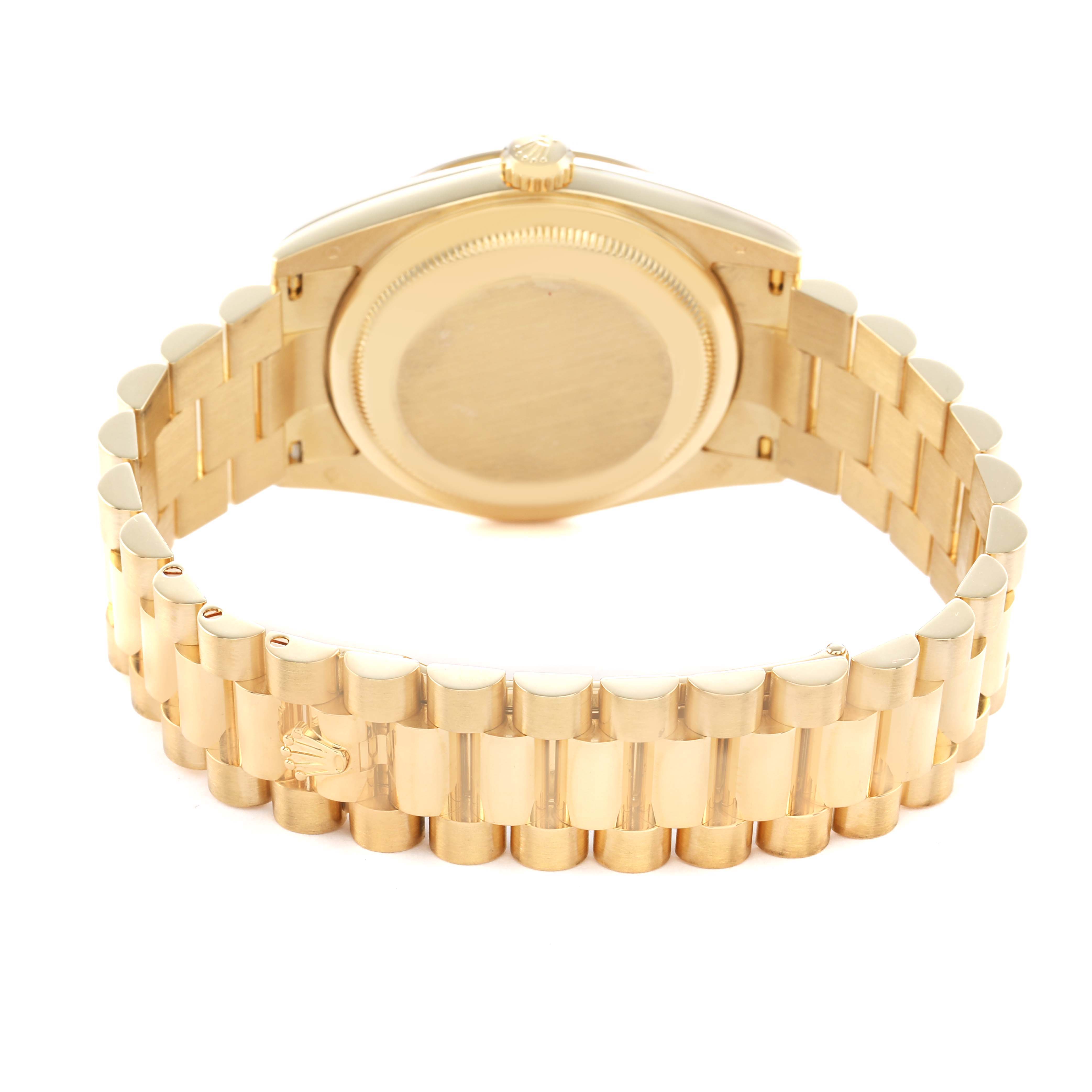 The image shows the back and bracelet of a Rolex President 118238 Men's Yellow Gold Black Dial model watch, highlighting its gold links and case back.