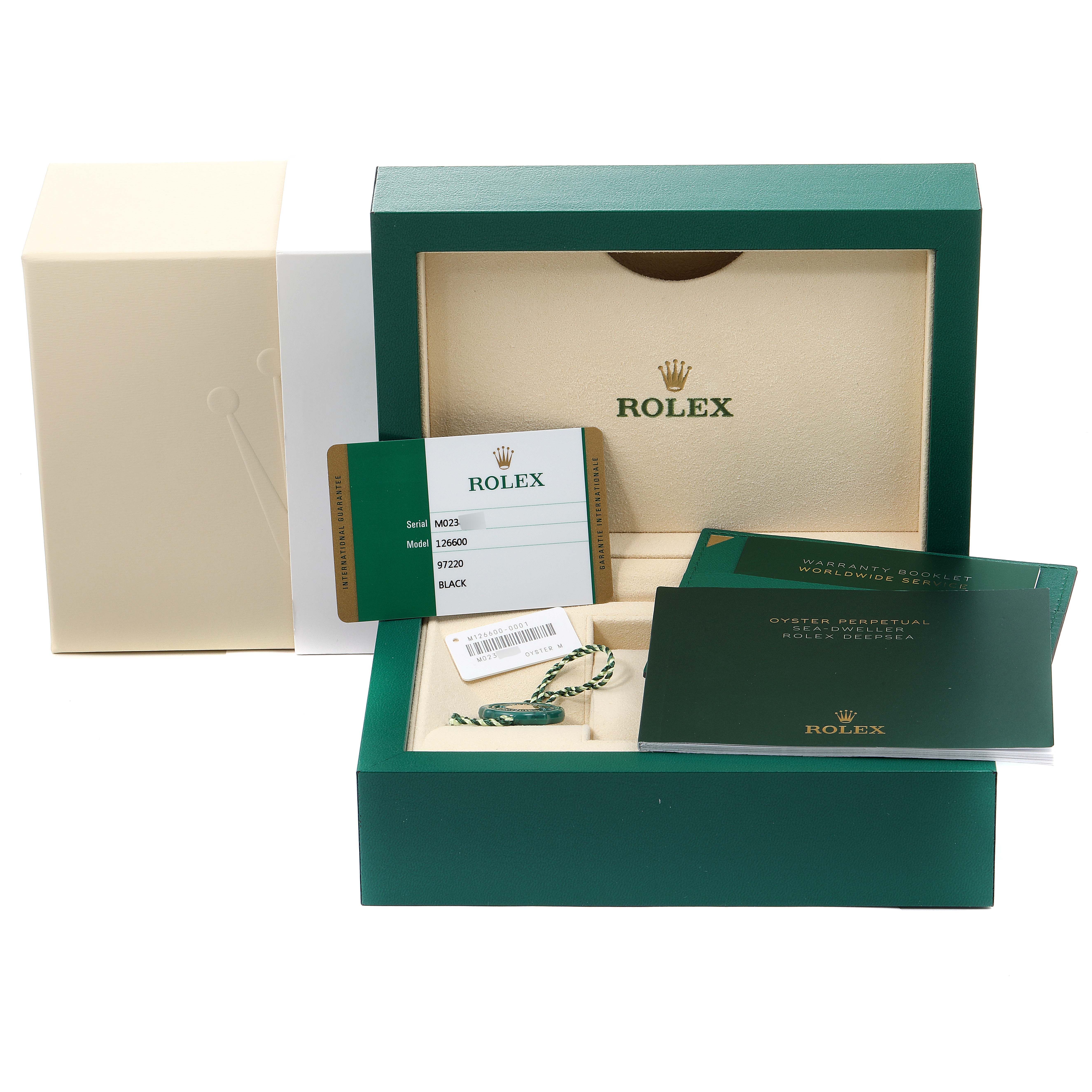 The image shows the packaging, warranty booklet, tags, and identification card for the Rolex Sea-Dweller 126600 Men
s Stainless Steel Black Dial 126600 Men
s Stainless Steel Black Dial watch.