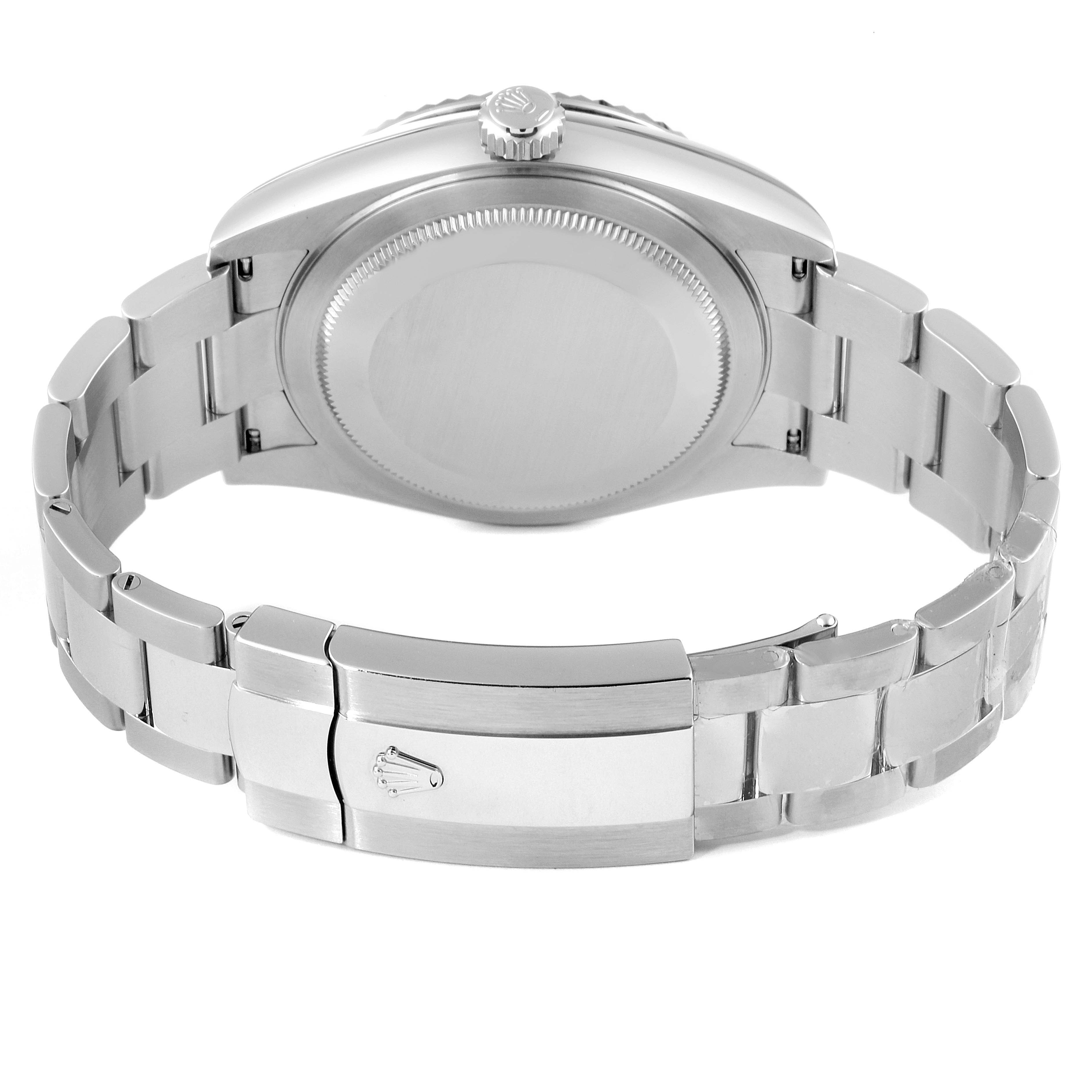 The image shows the backside and clasp of a Rolex Sky-Dweller 326934 Men's Stainless Steel Black Dial 326934 Men's Stainless Steel Black Dial with its bracelet spread out.