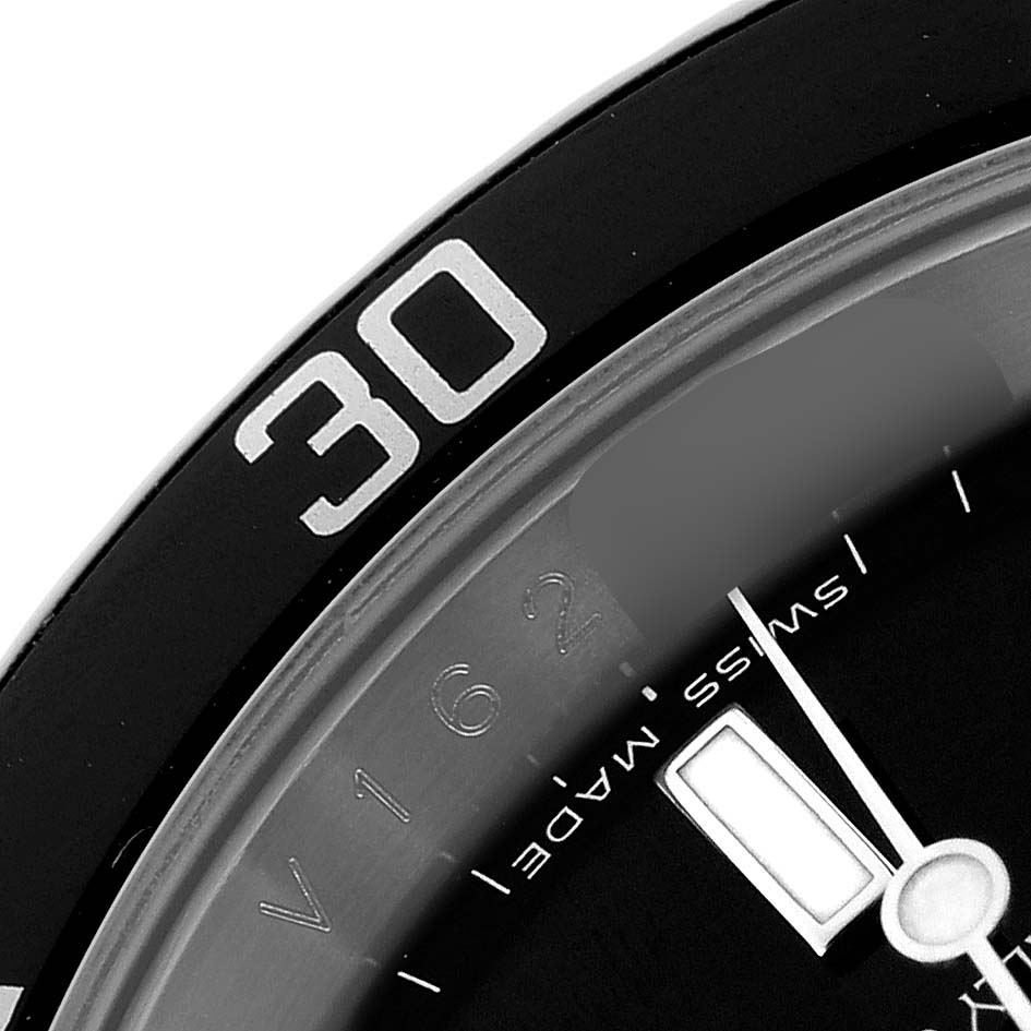The image shows a close-up of the bezel and dial of a Rolex Submariner 16610 Men
s Stainless Steel Black Dial 16610 Men
s Stainless Steel Black Dial, highlighting the "30" marker on the bezel.