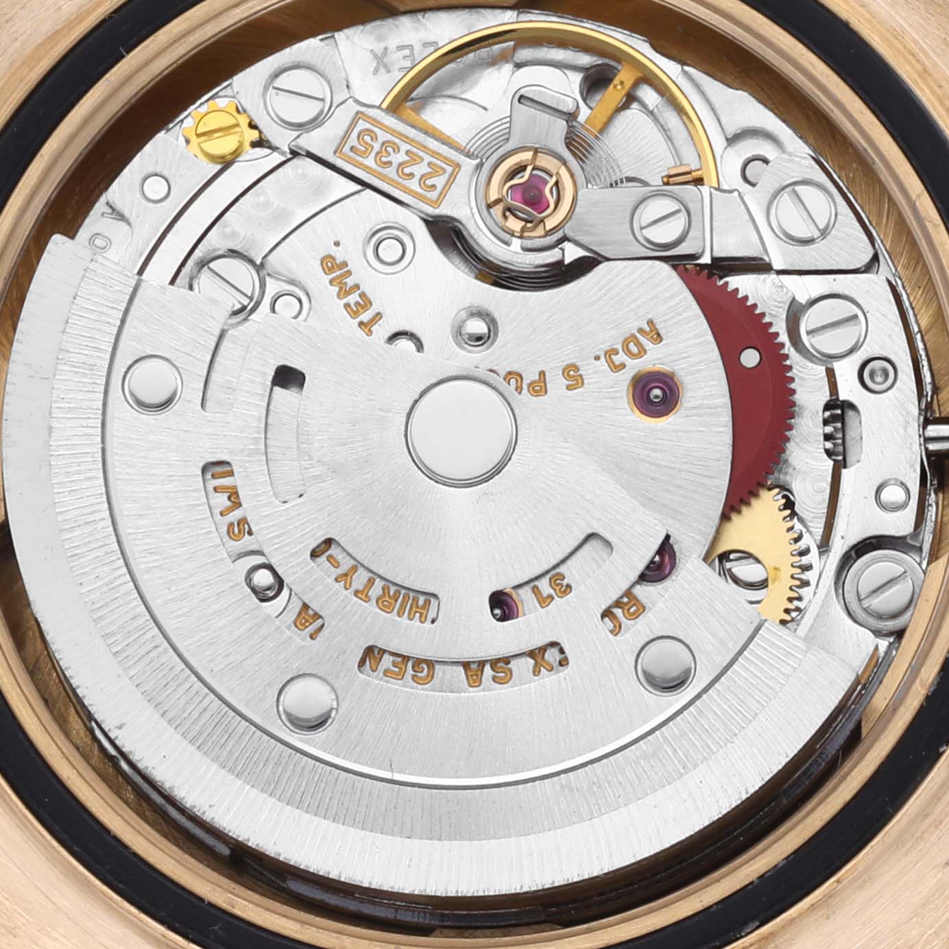 The image shows a close-up view of the Rolex Yacht-Master 169628 Women's Yellow Gold Grey Dial 169628 Women's Yellow Gold Grey Dial watch movement, highlighting the rotor and gear components.