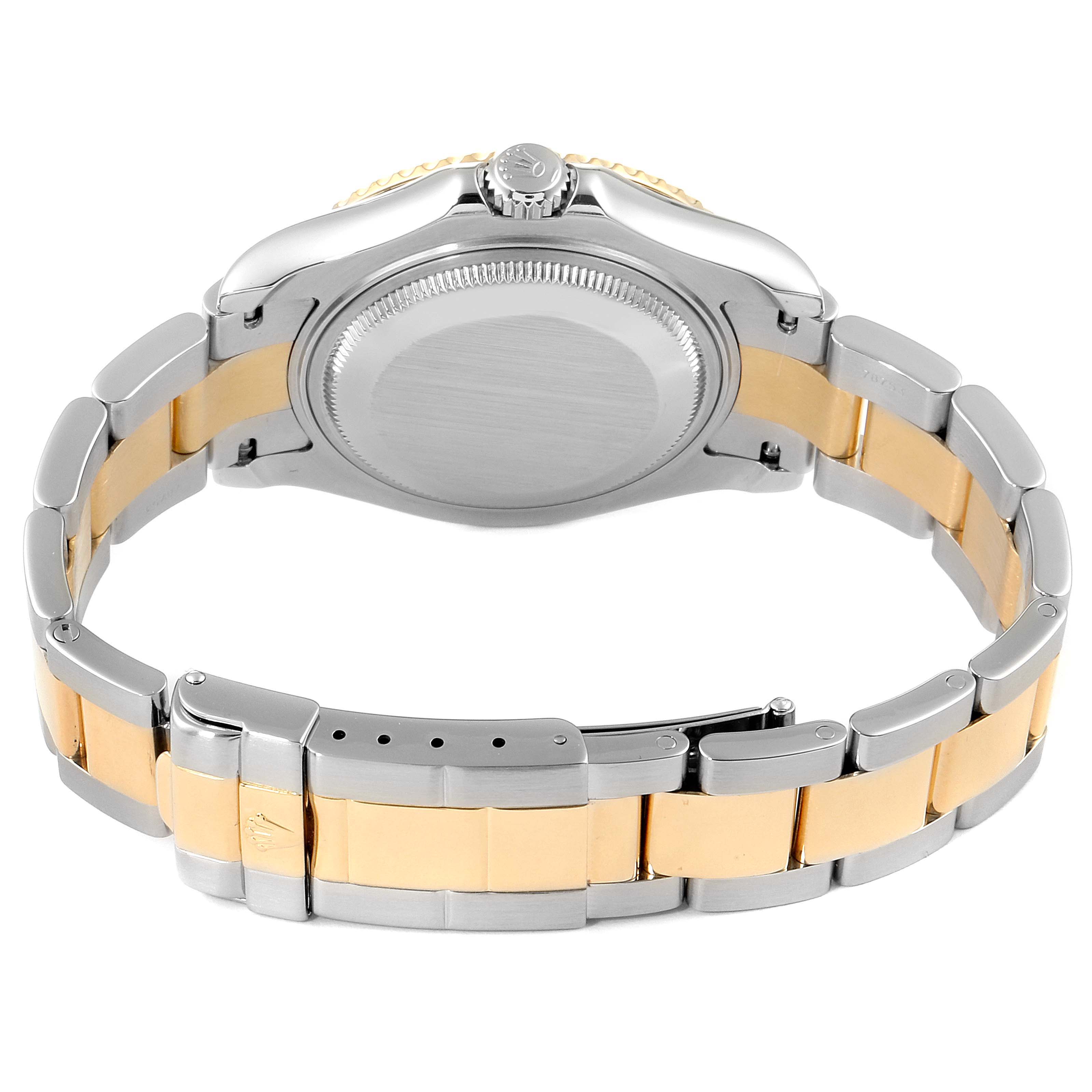 The image shows the case back and bracelet of a Rolex Yacht-Master 168623 Men's Steel and Gold (two tone) White Dial 168623 Men's Steel and Gold (two tone) White Dial watch at a side angle.
