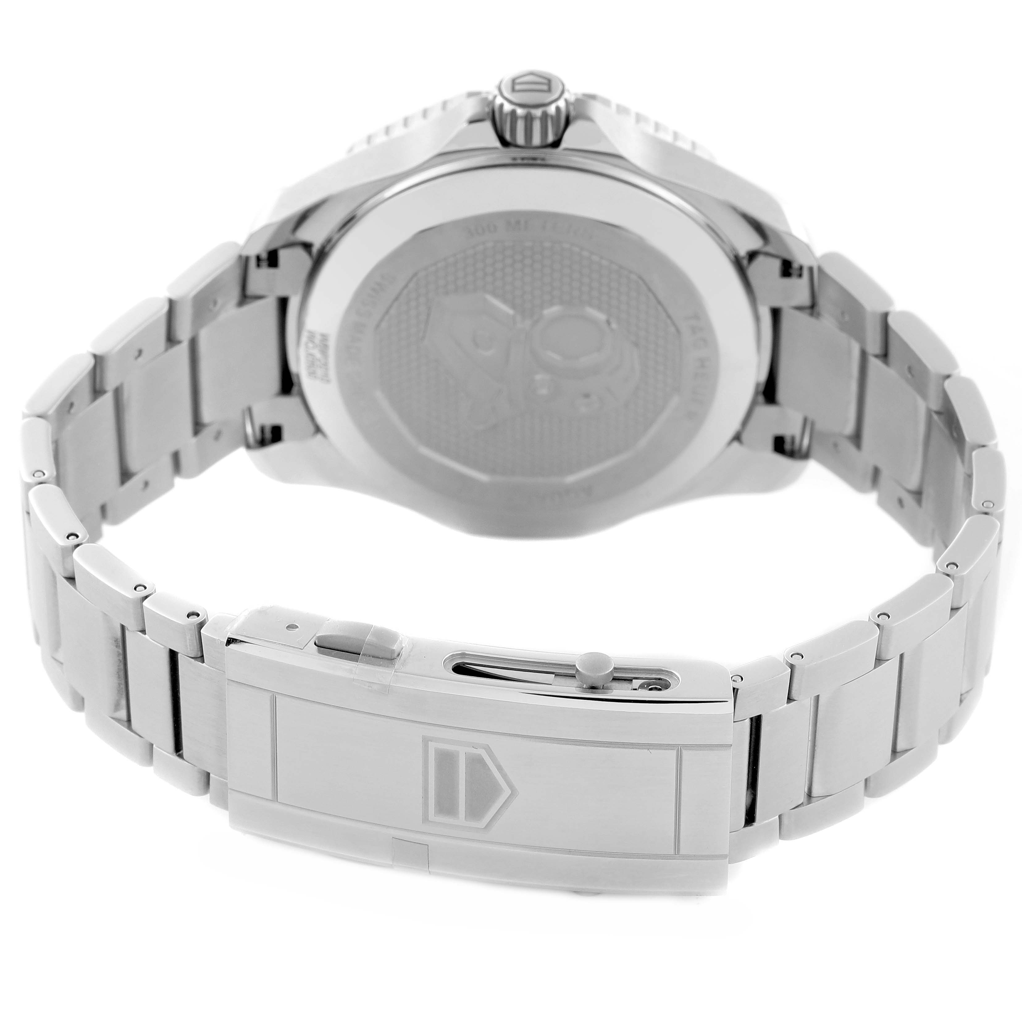 The image shows the back view of a Tag Heuer Aquaracer WBP2010 Men's Stainless Steel Blue Dial watch, highlighting its clasp and case back.