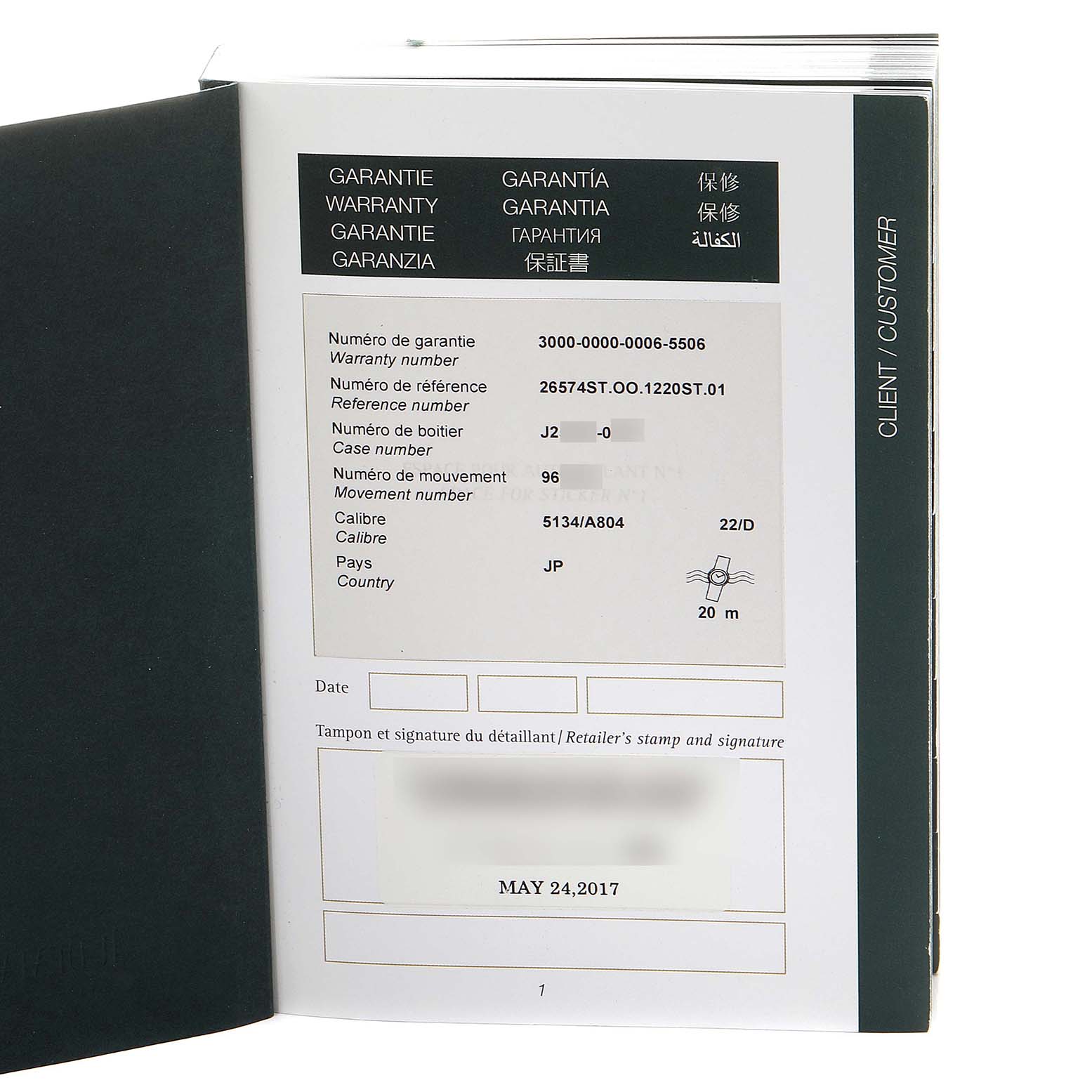 The image shows the warranty card for a Royal Oak model by Audemars Piguet with details like the warranty number, reference number, and date.