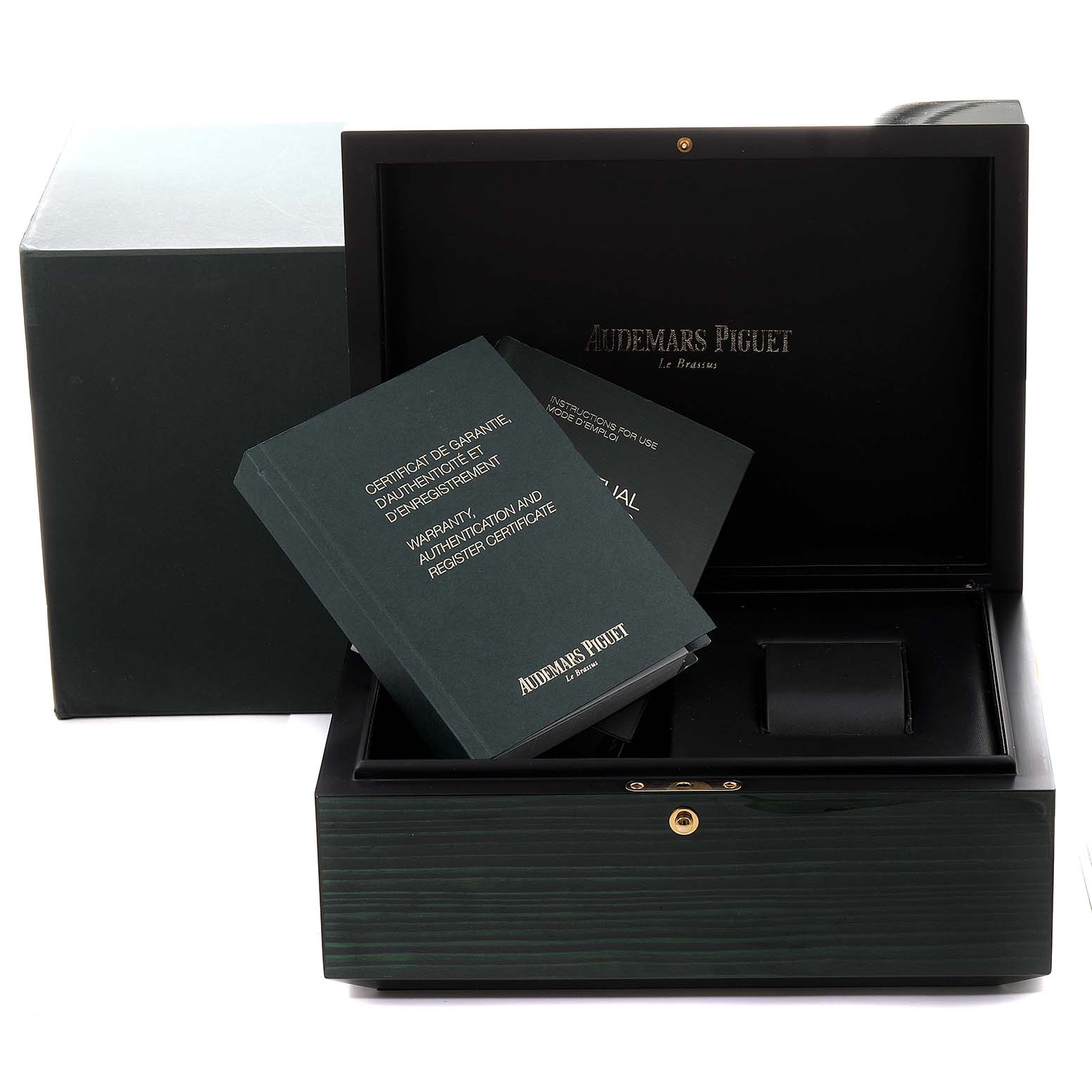 The image shows the open box of an Audemars Piguet Royal Oak 26574ST.OO.1220ST.01 Men's Stainless Steel Silver Dial 26574ST.OO.1220ST.01 Men's Stainless Steel Silver Dial watch, containing the warranty and authentication documents.