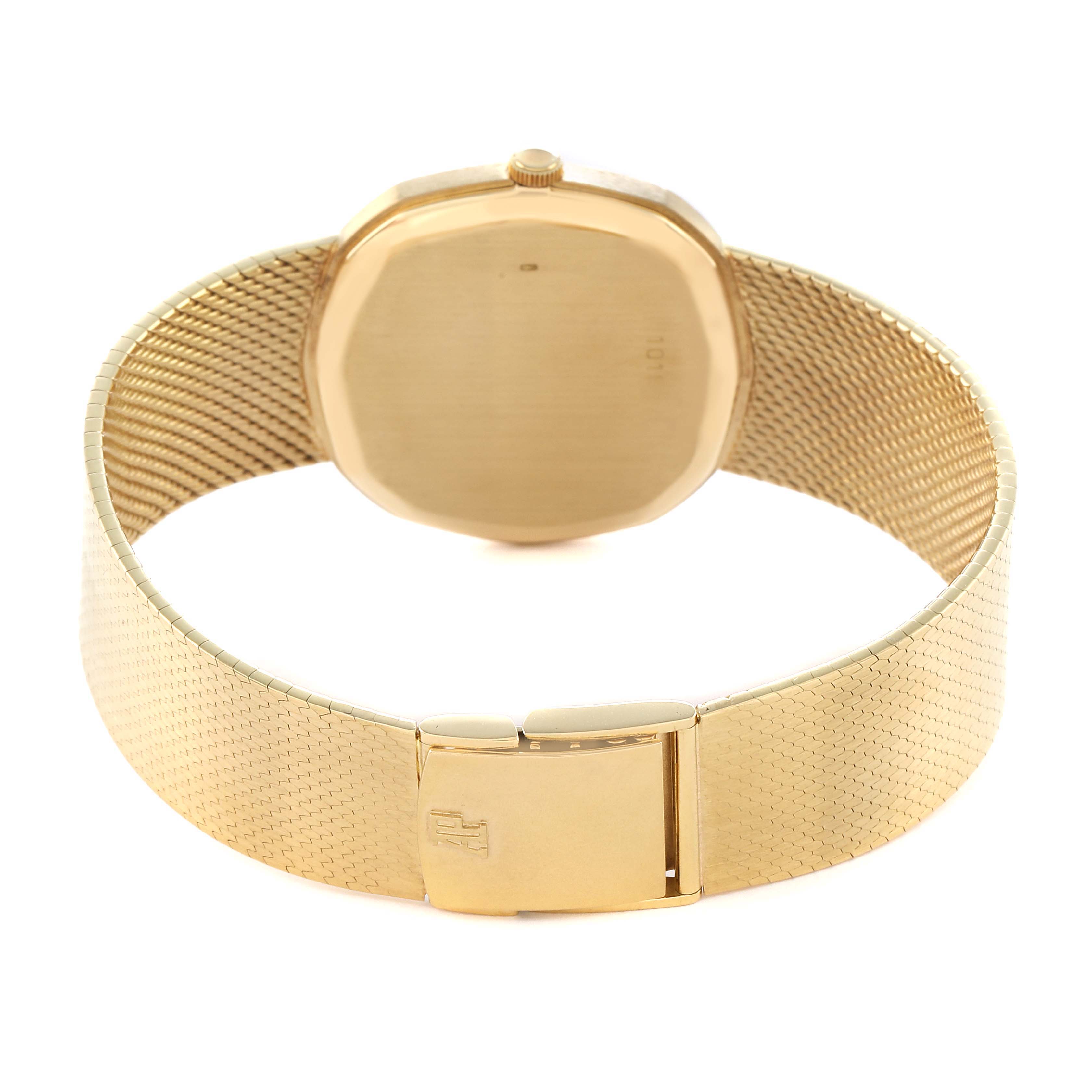 The image shows the back view of a Vintage Audemars Piguet watch with a gold mesh strap and clasp.