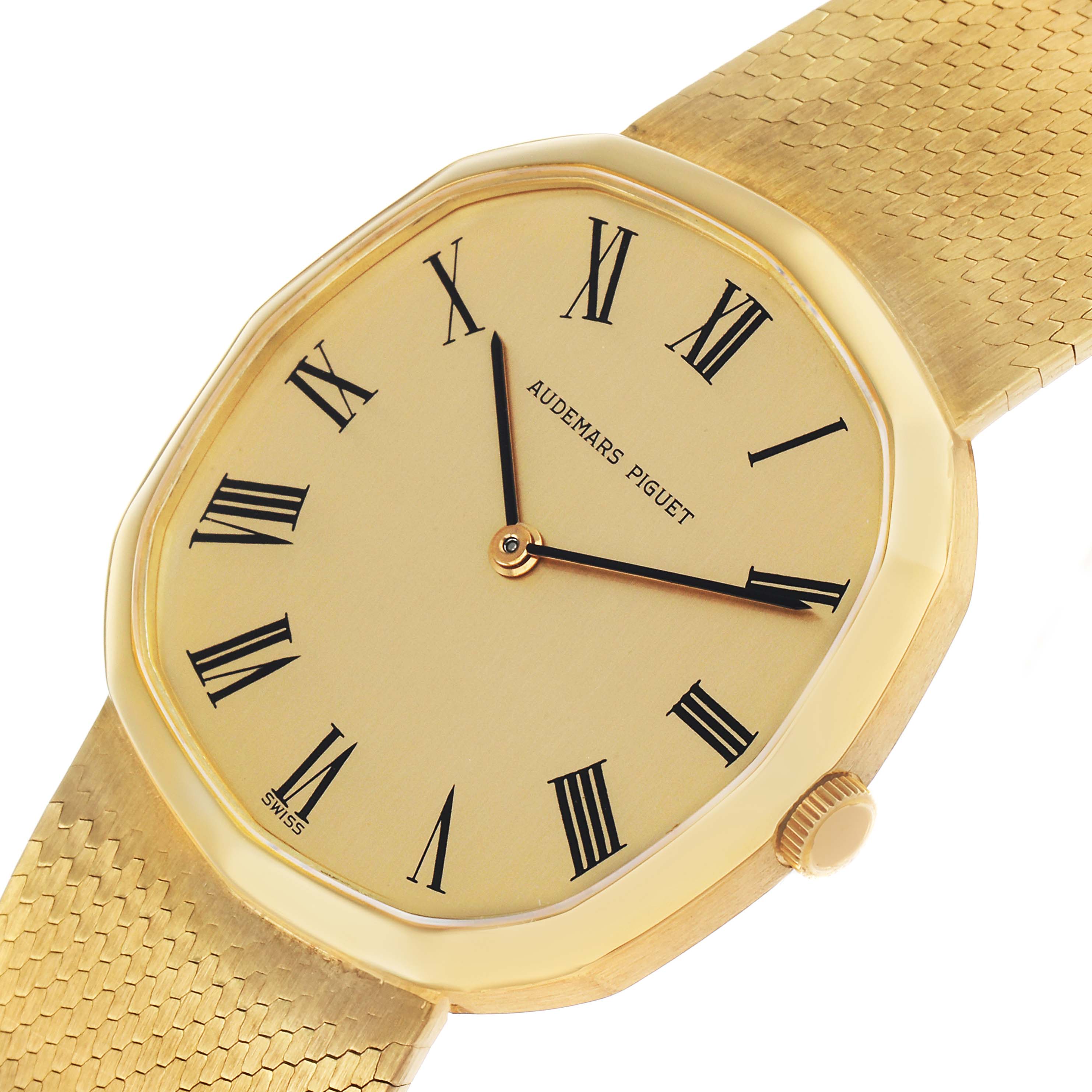 The Audemars Piguet Vintage Men's Yellow Gold Champagne Dial watch is shown at an angled view, highlighting its gold case, Roman numeral dial, and textured bracelet.