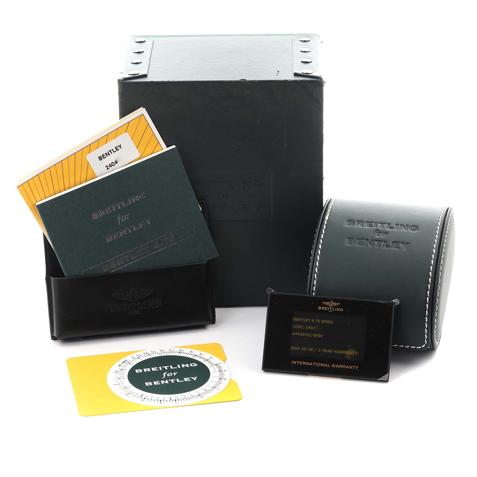 The image shows a Breitling for Bentley packaging, warranty card, manuals, and carrying case from a frontal angle.