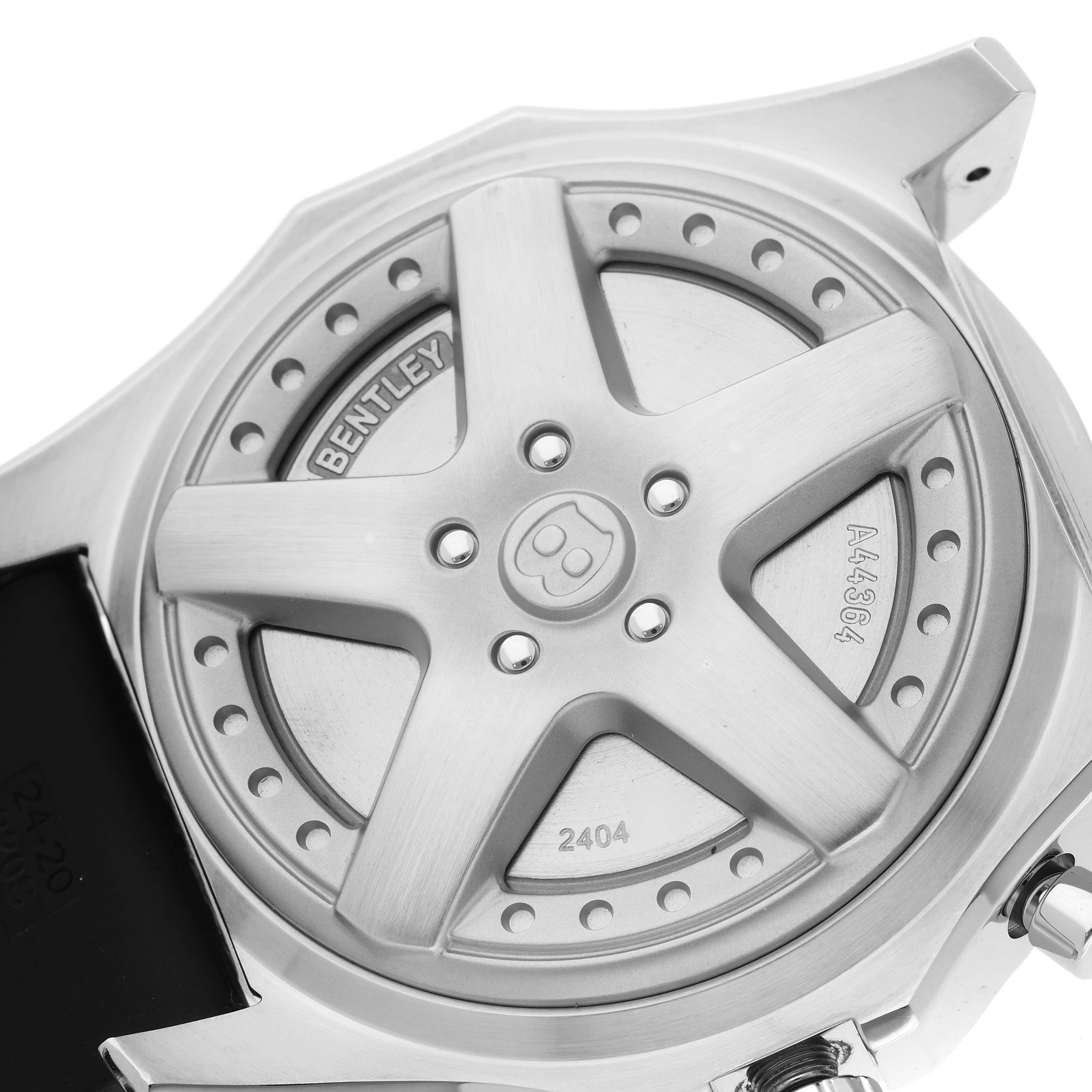 The image shows the back case of a Breitling Bentley A4436412/B595 Men's Stainless Steel Black Dial A4436412/B595 Men's Stainless Steel Black Dial watch, featuring a wheel rim design.