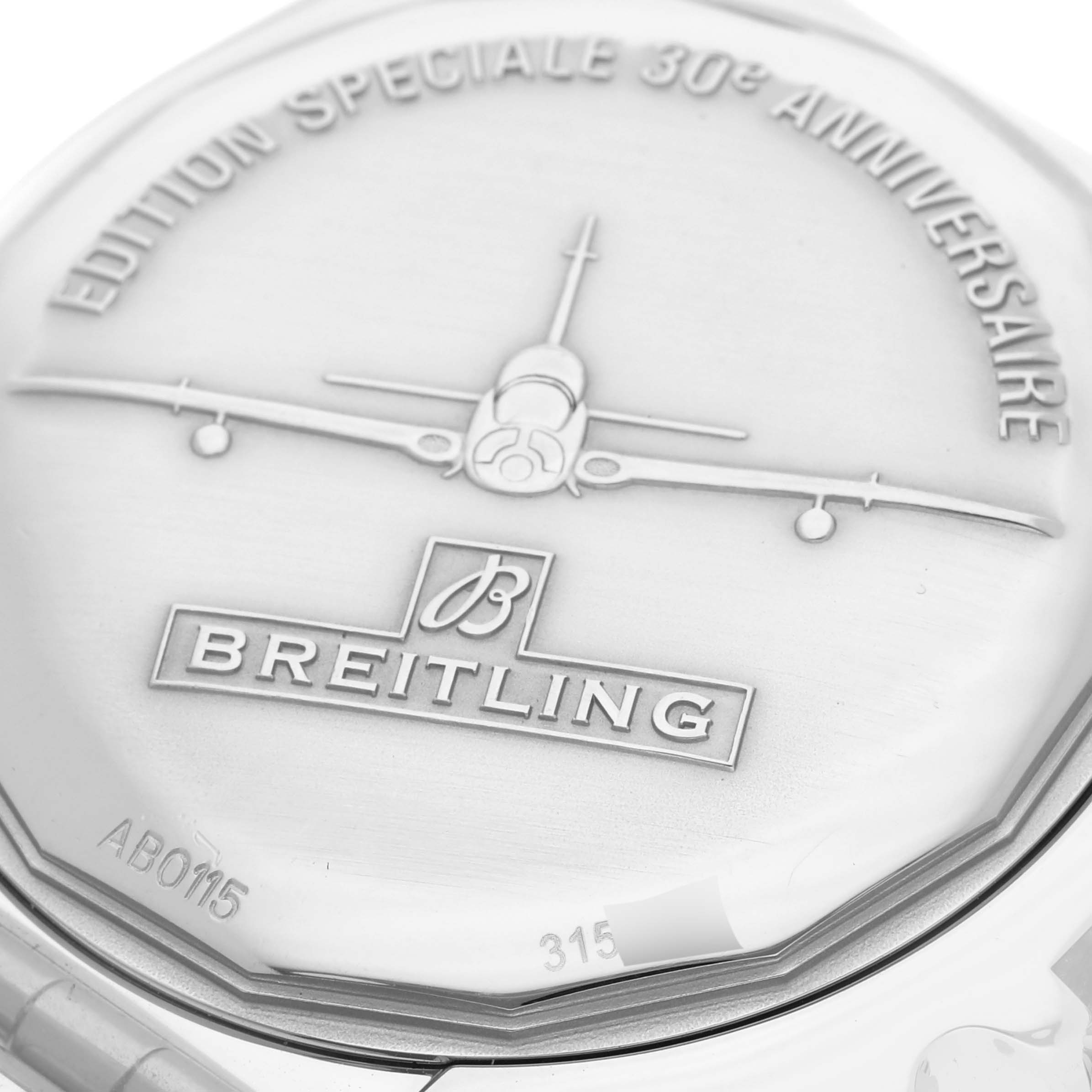 The image shows the case back of a Breitling Chronomat AB01154G/BD13 Men's Stainless Steel Black Dial AB01154G/BD13 Men's Stainless Steel Black Dial watch at a close angle, highlighting the engraved logo and text.