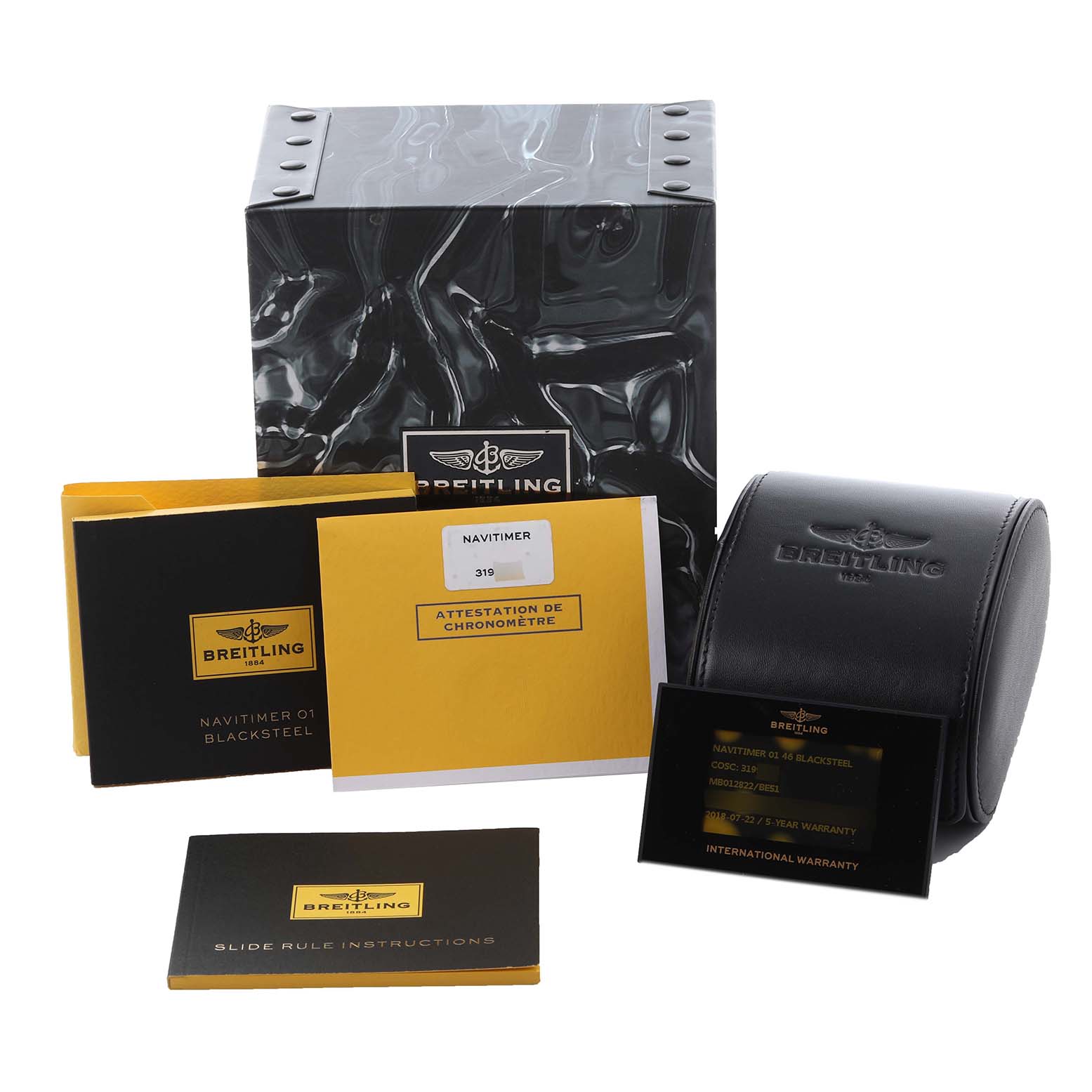 The image shows Breitling Navitimer MB012822/BE51 Men
s Stainless Steel Black Dial MB012822/BE51 Men
s Stainless Steel Black Dial accessories: box, warranty, manuals, and case from a front angle.