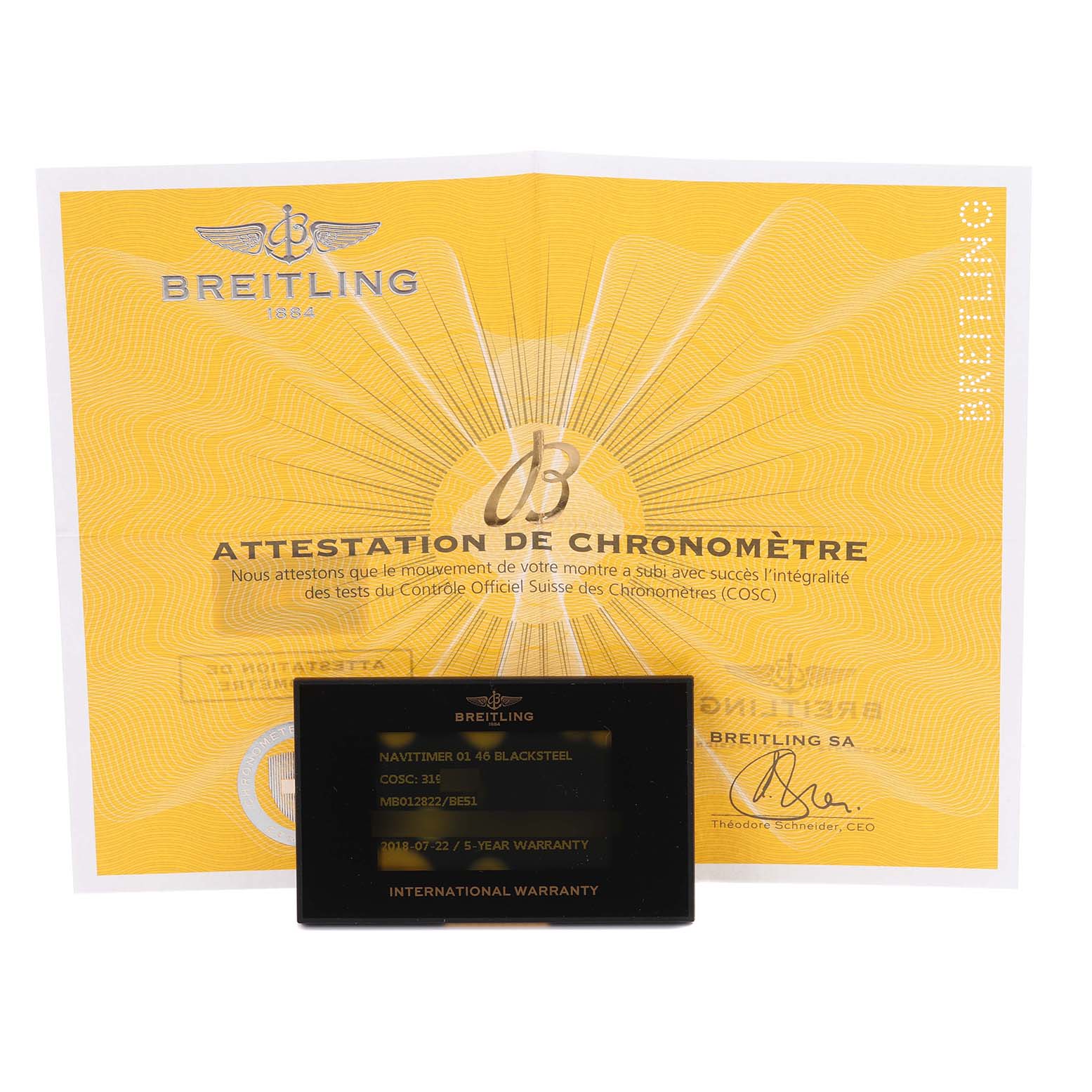The image shows a Breitling Navitimer MB012822/BE51 Men
s Stainless Steel Black Dial MB012822/BE51 Men
s Stainless Steel Black Dial warranty card and chronometer certificate document.