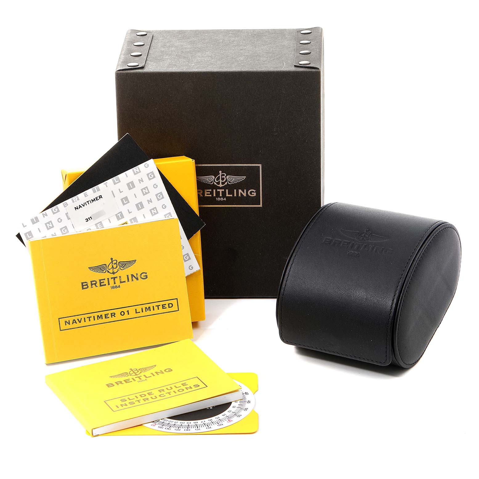 The image shows the packaging, manuals, and case for the Breitling Navitimer AB0123 Men's Stainless Steel Silver Dial AB0123 Men's Stainless Steel Silver Dial model watch.