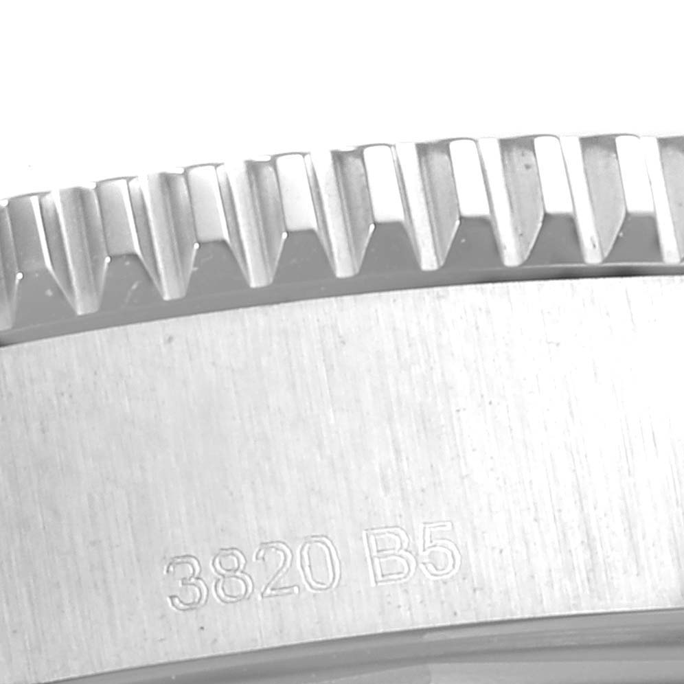 The image shows a close-up of the serrated edge and the side of the case for a Breitling Superocean A17366 Men's Stainless Steel Black Dial A17366 Men's Stainless Steel Black Dial watch.