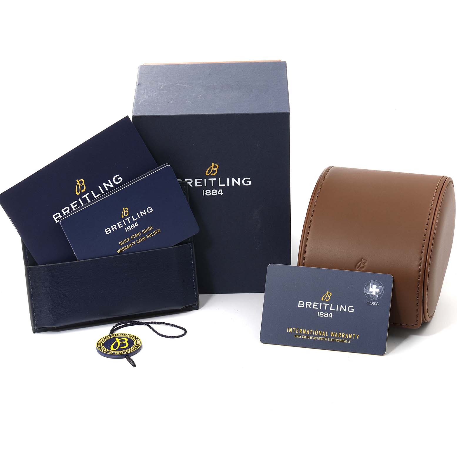 The accessories shown for the Breitling Superocean A17366 Men's Stainless Steel Black Dial A17366 Men's Stainless Steel Black Dial include a box, warranty cards, a leather pouch, and a tag.