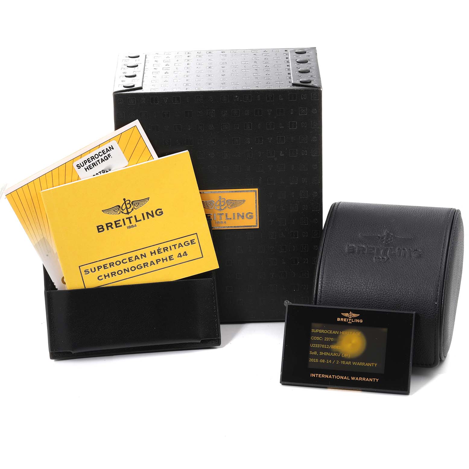 The image shows the packaging, manuals, and warranty card for the Breitling Superocean U23370 Men
s Steel and Gold (two tone) Black Dial U23370 Men
s Steel and Gold (two tone) Black Dial model.